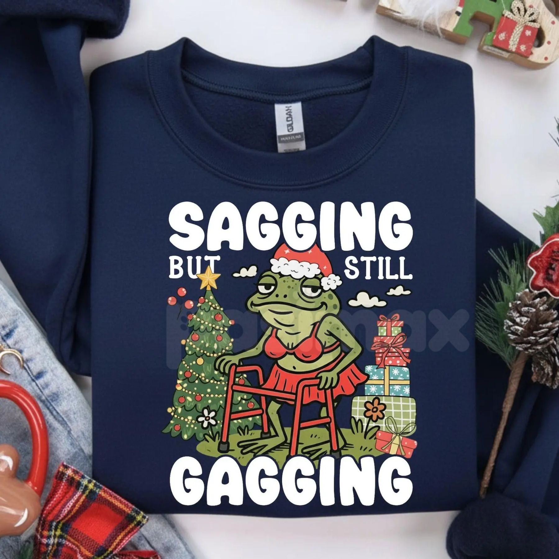 Pasimax "Sagging But Still Gagging" Funny Christmas Meme Frog Sweatshirt – Sarcastic Holiday Crewneck — detail close-up