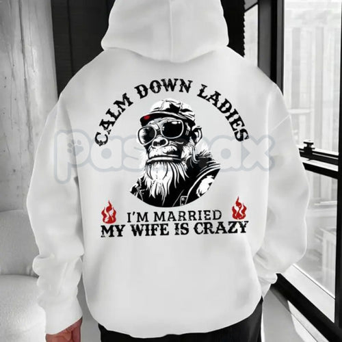 Calm Down Ladies I’m Married & My Wife Is Crazy Hoodie – Funny Husband Gift, Sarcastic Marriage Protection Pullover, Edgy Men’s Streetwear