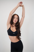 KIMITH BRAND I Live in Luxury Black Sports Bra — main product shot