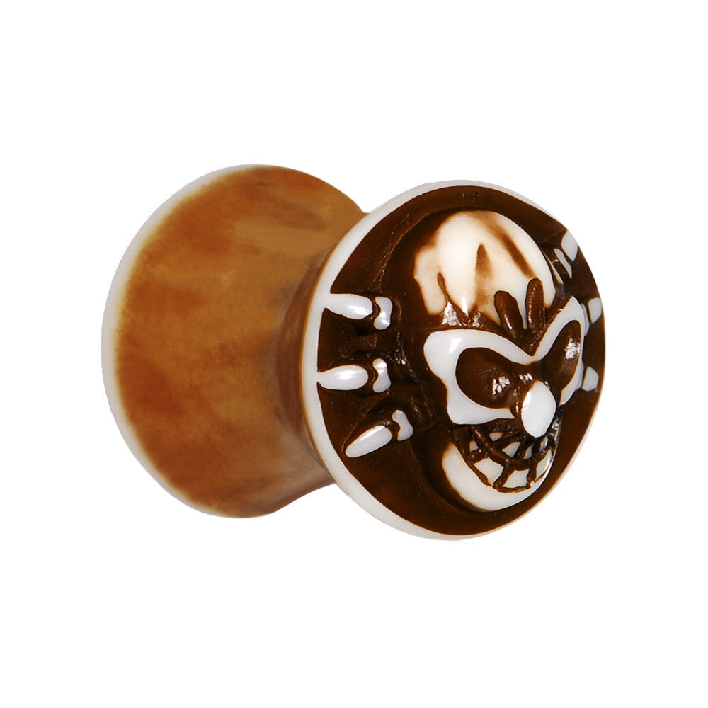 BodyCandy 0G Brown White Resin Skull Saddle Plug — main product shot