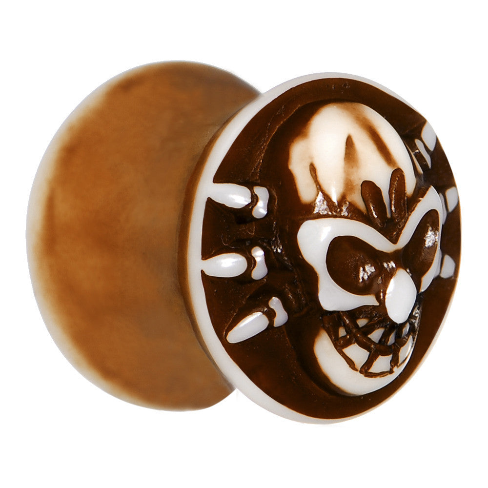 BodyCandy 1/2 Brown White Resin Skull Saddle Plug — main product shot