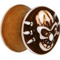 BodyCandy 9/16 Brown White Resin Skull Saddle Plug — main product shot