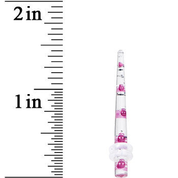 BodyCandy 8G Clear Acrylic Glitter Purple Skull Confetti Taper — lifestyle context