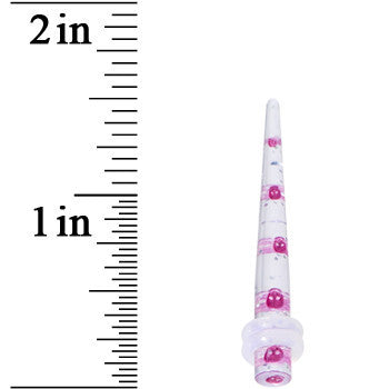 BodyCandy 6G Clear Acrylic Glitter Purple Skull Confetti Taper — lifestyle context