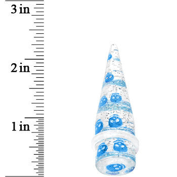BodyCandy 5/8 Clear Acrylic Glitter Blue Skull Confetti Taper — lifestyle context