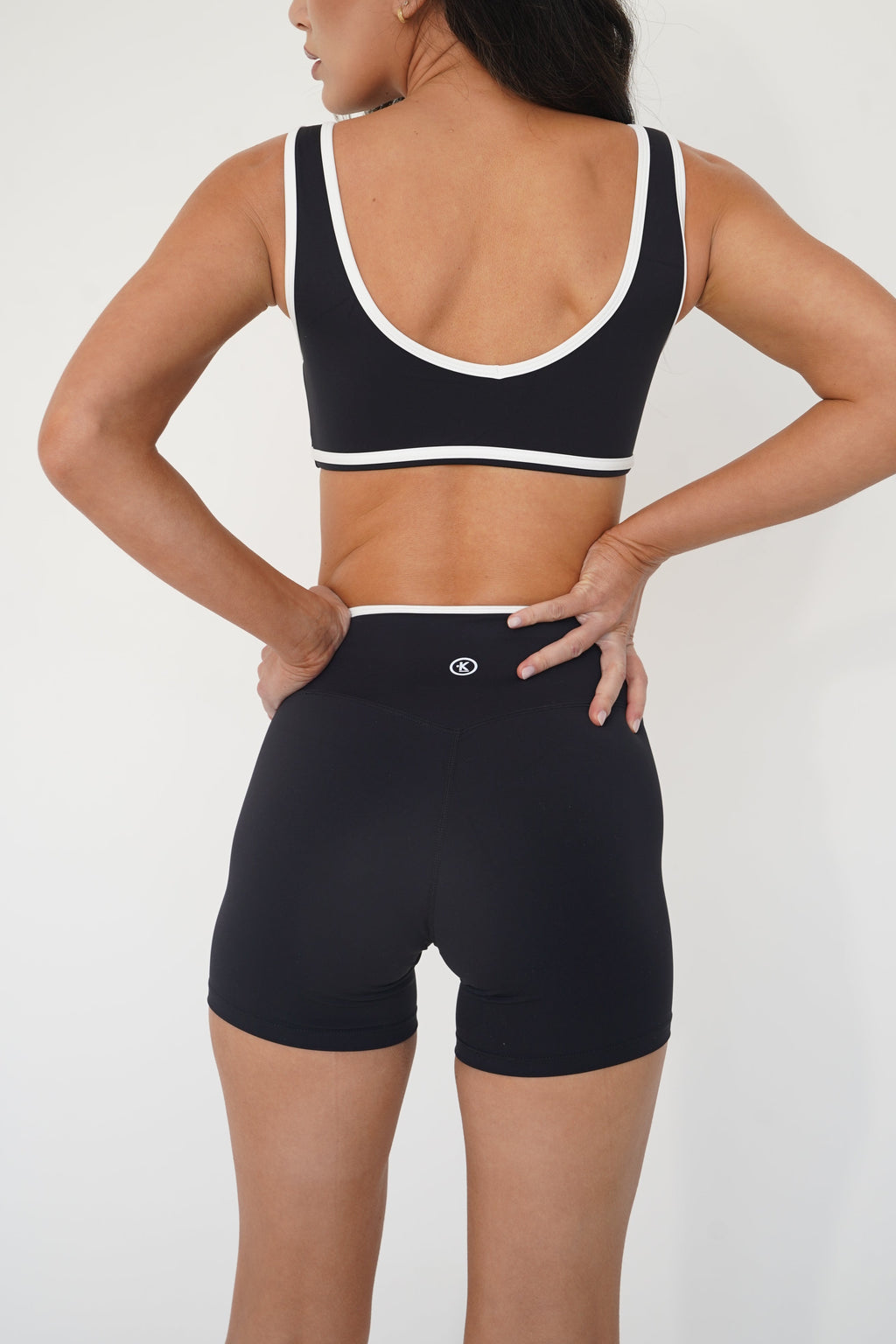 KIMITH BRAND I Am Right Where I Need To Be Black Butter Sports Bra — in-use photo
