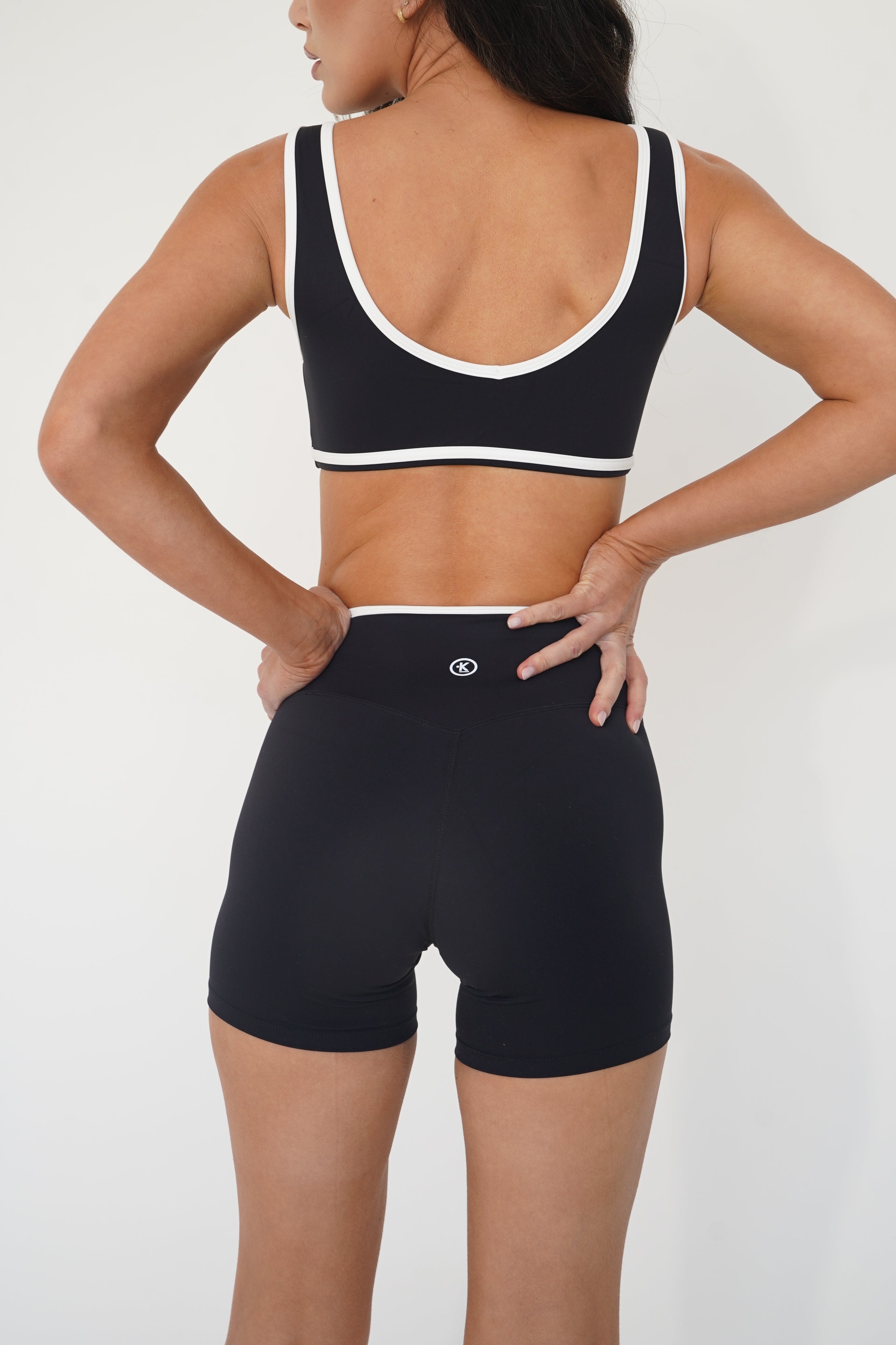 KIMITH BRAND I Am Right Where I Need To Be Black Butter Sports Bra — in-use photo