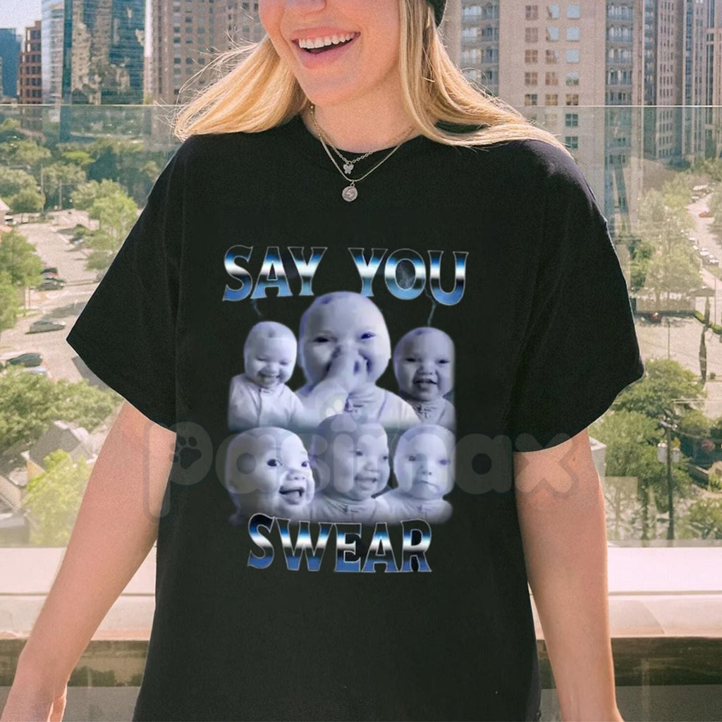 Pasimax Niche Baby Holding Laugh Graphic T-Shirt - Ironic Surreal Meme Tee, Funny Aesthetic "Shitpost" Apparel, Trendy Weird 
