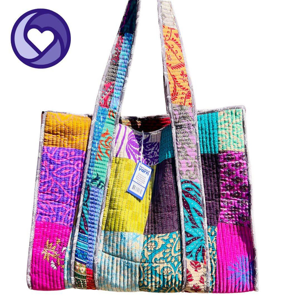 Darn Good Yarn Quilted Cotton Tote — Darn Good Yarn branding close-up