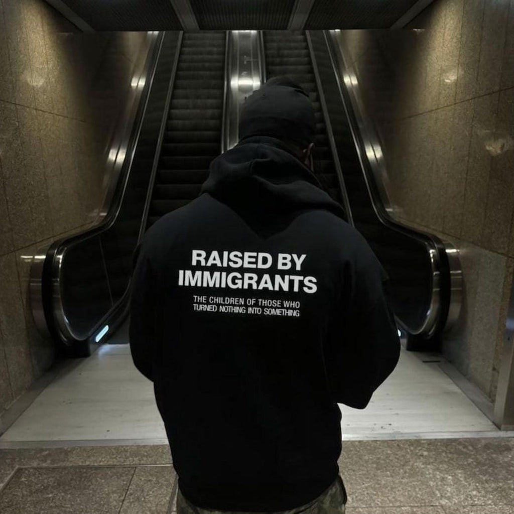 Pasimax Raised By Immigrants Hoodie — lifestyle context