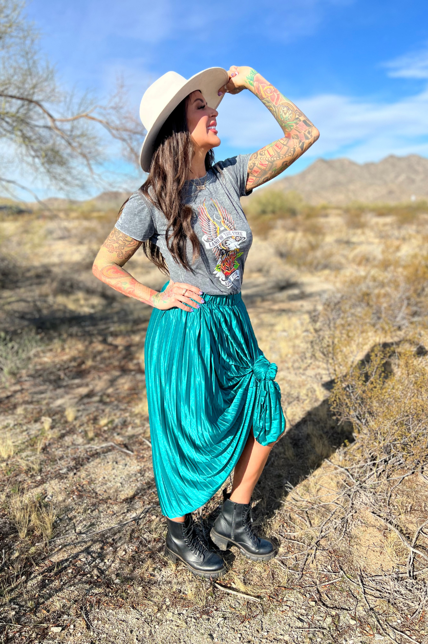 Pretty Little Patriot Pretty Little Patriot Emerald Green Maxi Skirt — Pretty Little Patriot branding close-up