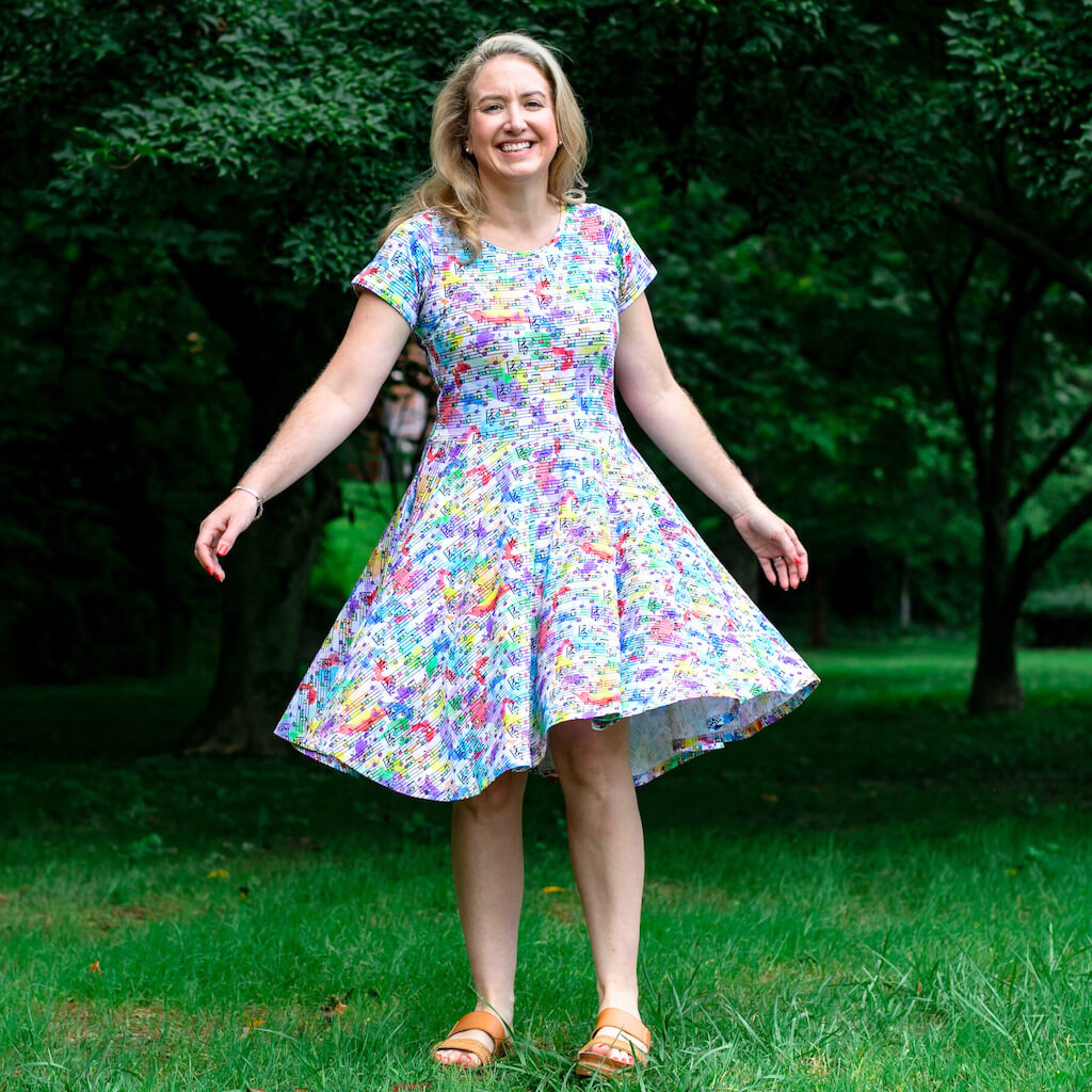 Princess Awesome & Boy Wonder Adult "Staff Meeting" Rainbow Music Notes Super Twirler Dress with Pockets — main product shot