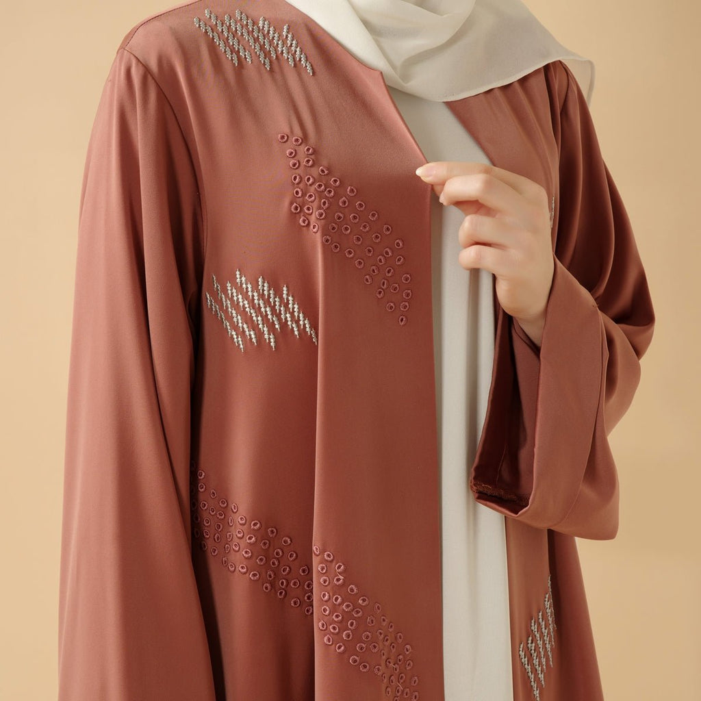 Mariam's Collection 3D Embroidery Abaya With Geometric Beads. 3D Embroidered Open Abaya (MOA085) — Mariam's Collection branding close-up