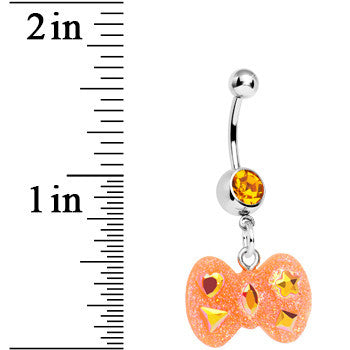 BodyCandy Yellow Gem Orange Glitter Bow Dangle Belly Ring — detail close-up