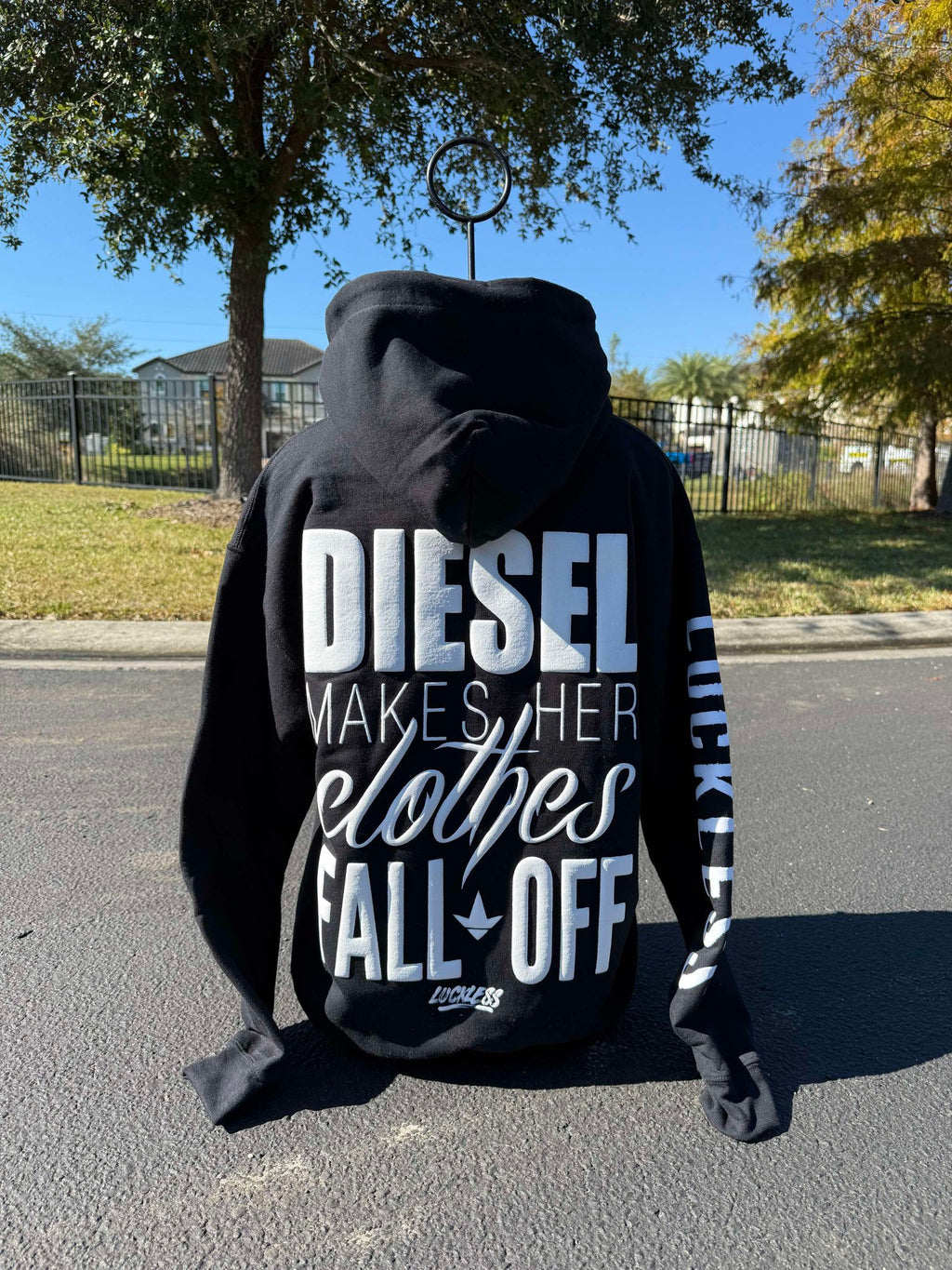 Luckless Outfitters Diesel Makes Her Clothes Fall Off Hoodie — detail close-up