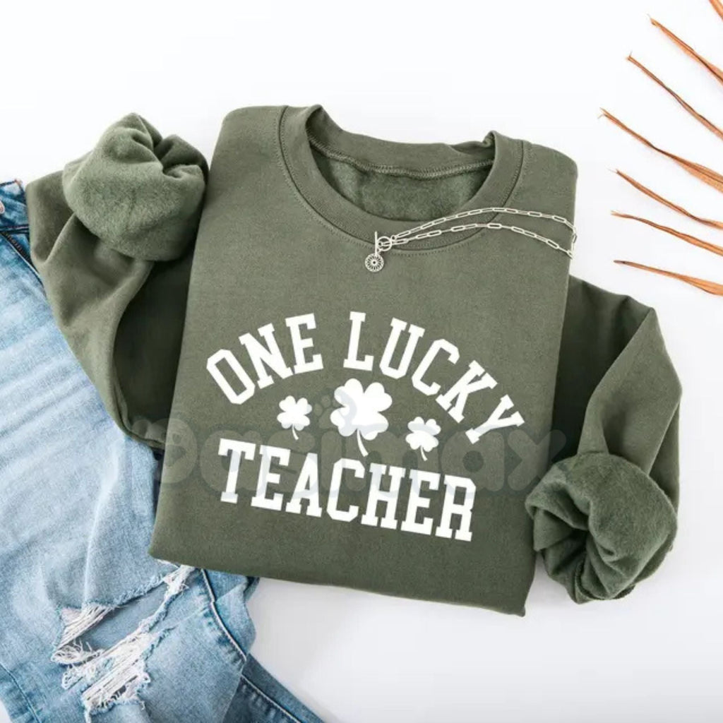 Pasimax One Lucky Teacher Adult Sweatshirt | Green Varsity Lettering St Patrick's Day Crewneck | Shamrock Accent Teacher Pull