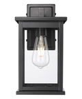 11"H Bowton II Outdoor Wall Light - Dusk to Dawn Matte Black Finish with Glass Shade by Millennium Lighting – LampsUSA