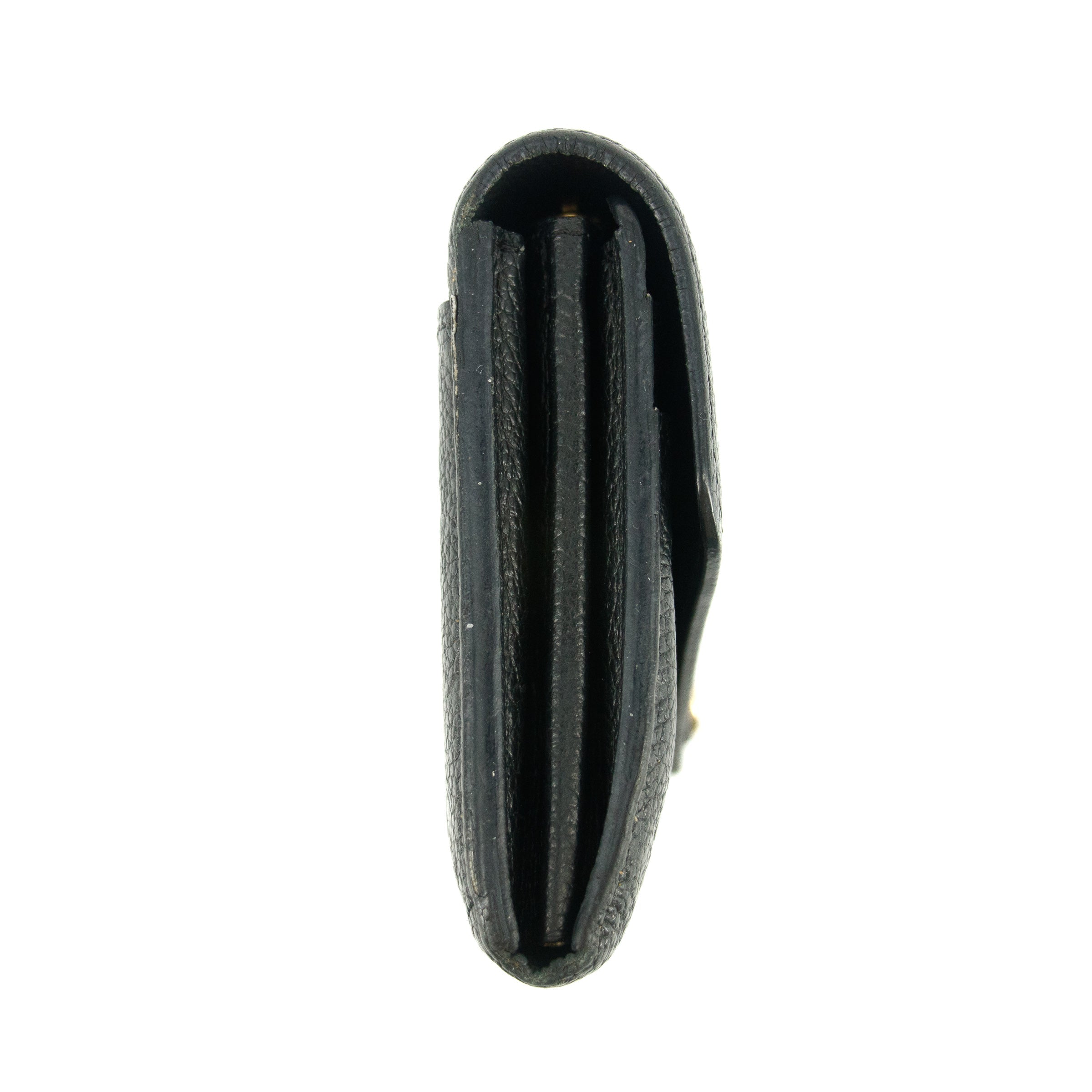 Bolt Boutique Louis Vuitton Monogram Empreinte Portefeuille Black Leather Wallet #5297 — lifestyle context