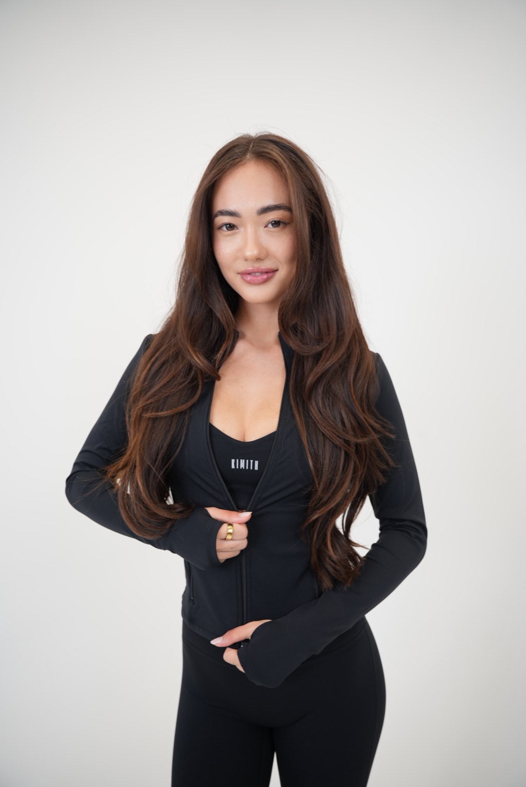 KIMITH BRAND I Live in Luxury Black Sports Bra — in-use photo