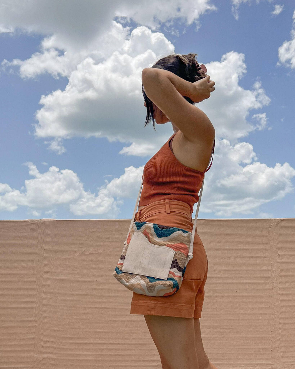 WONENA Yabisi Montañita Crossbody - Sand & Winikunka — artisanal handbags & clutches category context