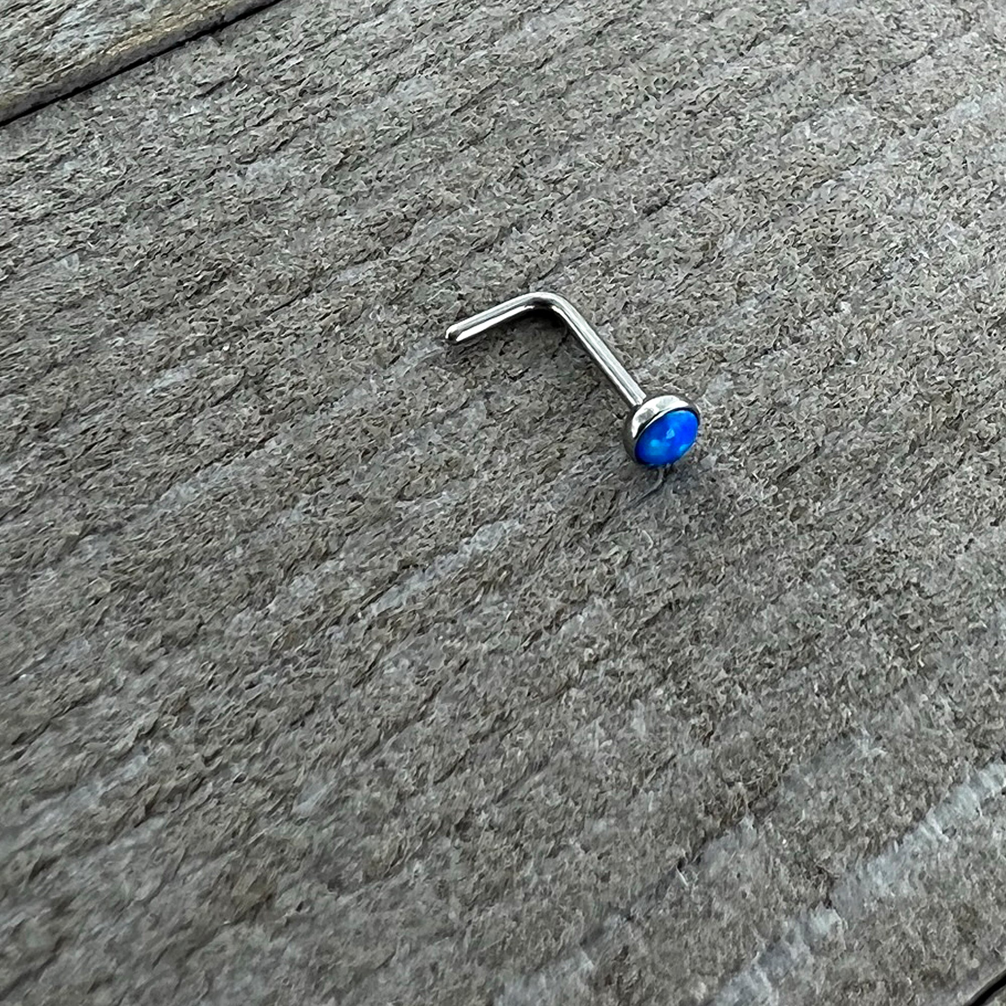 BodyCandy 20G 2mm Blue Synthetic Opal L-Shaped Nose Ring — lifestyle context