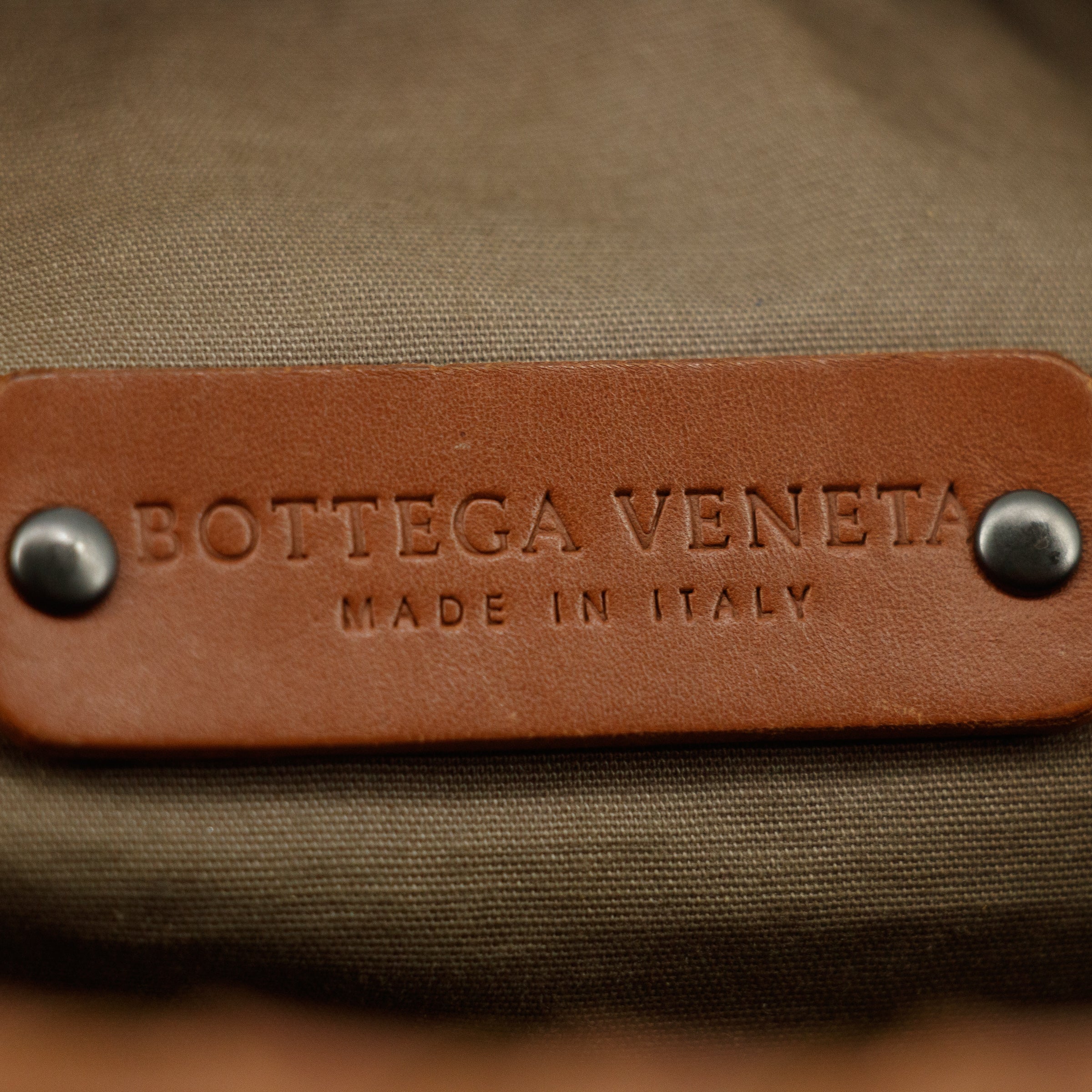 Bolt Boutique Bottega Veneta Intrrecciato Brown Leather Cosmetic Bag #5744 — in-use photo