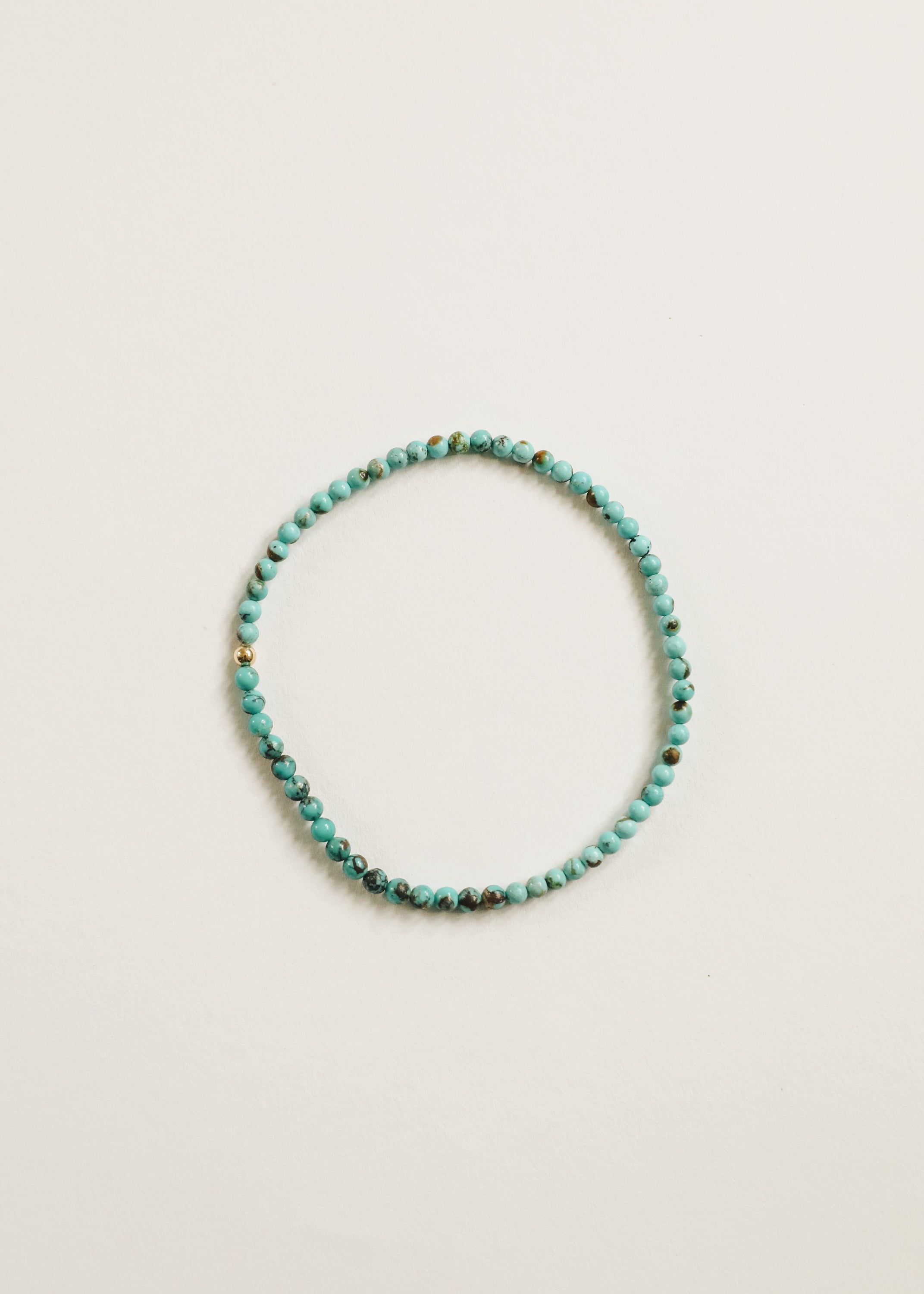 CanyonLeaf Natural Turquoise + 14K Gold Filled || Beaded Stretch Bracelet — lifestyle worn / used context