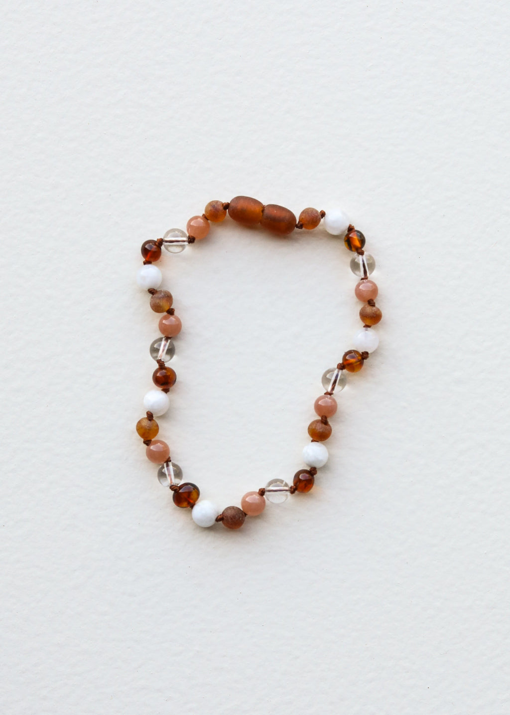 CanyonLeaf Baltic Sea Amber || Sunstone  + Moonstone || Natural Gemstone Necklace — lifestyle worn / used context