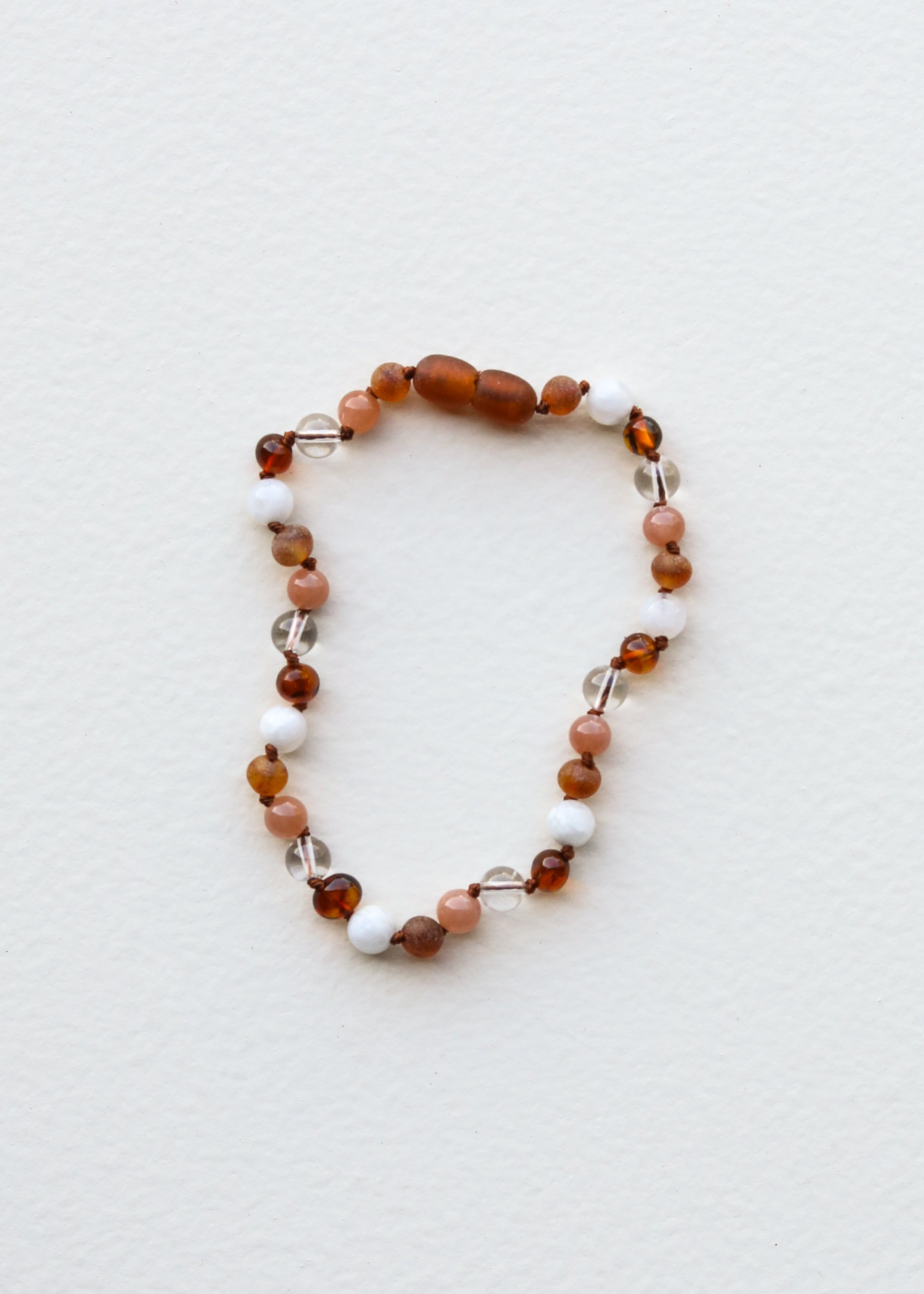 CanyonLeaf Baltic Sea Amber || Sunstone  + Moonstone || Natural Gemstone Necklace — lifestyle worn / used context