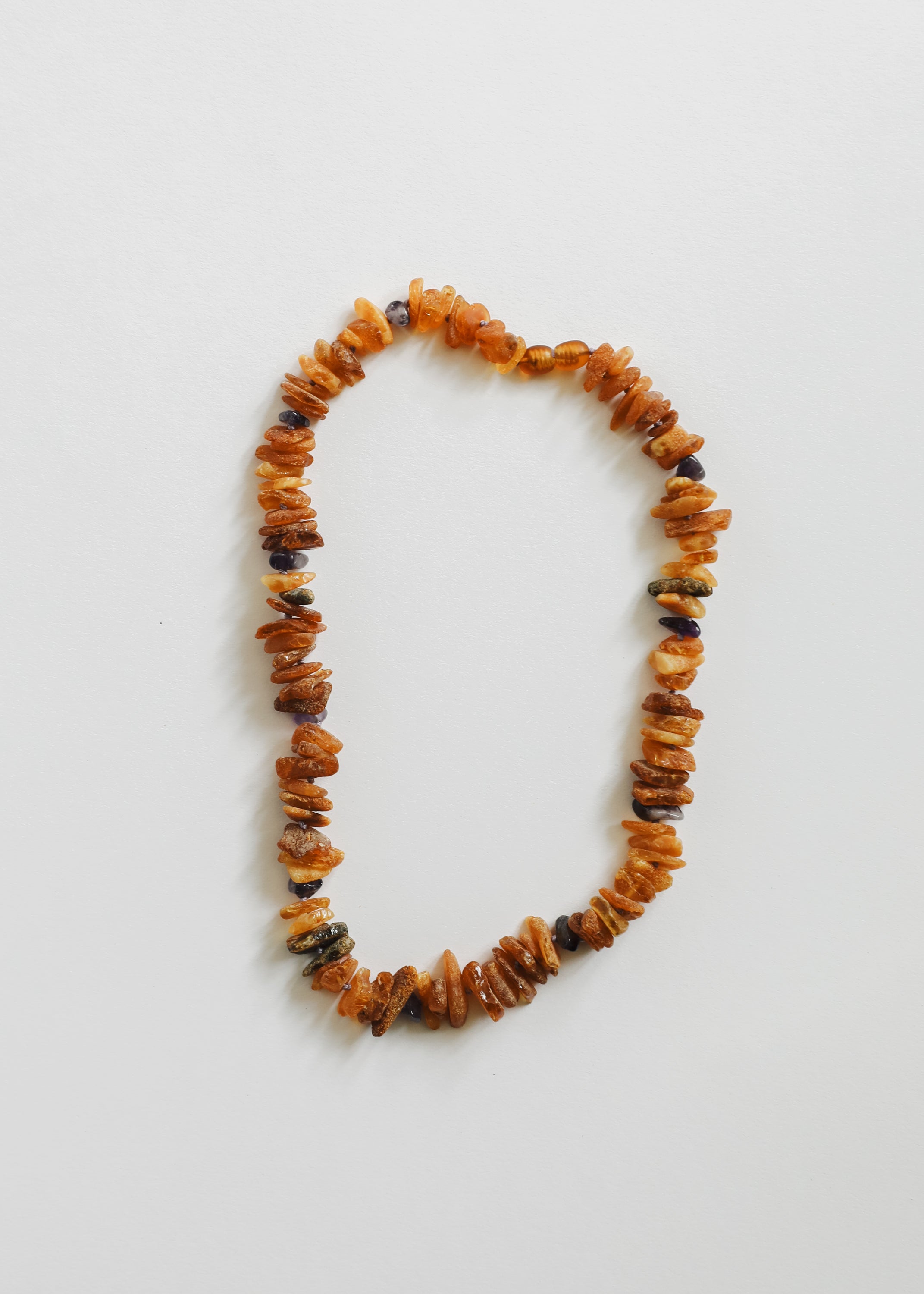 CanyonLeaf Pet Necklace: Raw Baltic Amber + Raw Amethyst — main product shot