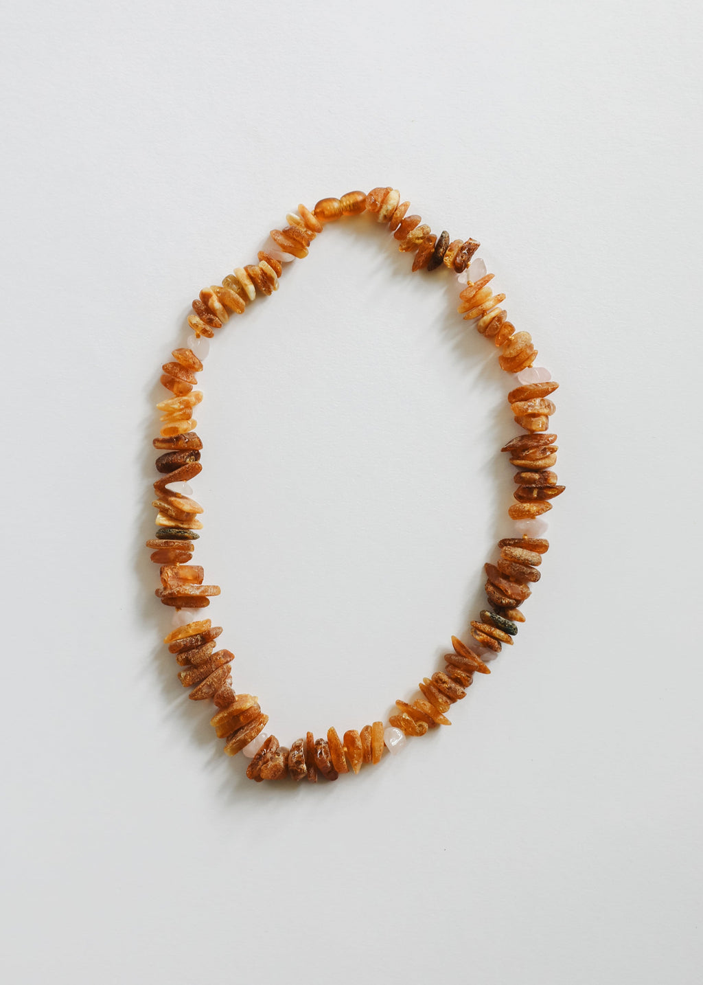 CanyonLeaf Pet Necklace: Raw Baltic Amber + Raw Rose Quartz — main product shot