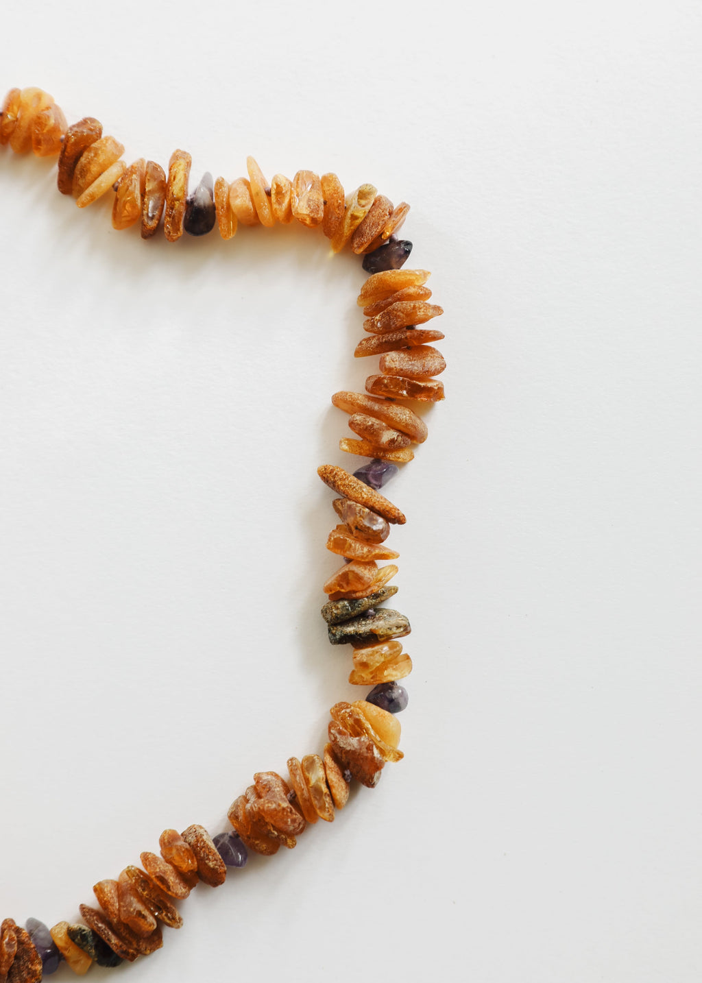CanyonLeaf Pet Necklace: Raw Baltic Amber + Raw Amethyst — detail close-up