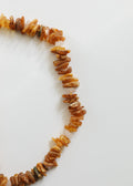 CanyonLeaf Pet Necklace: Raw Baltic Amber + Raw Rose Quartz — detail close-up