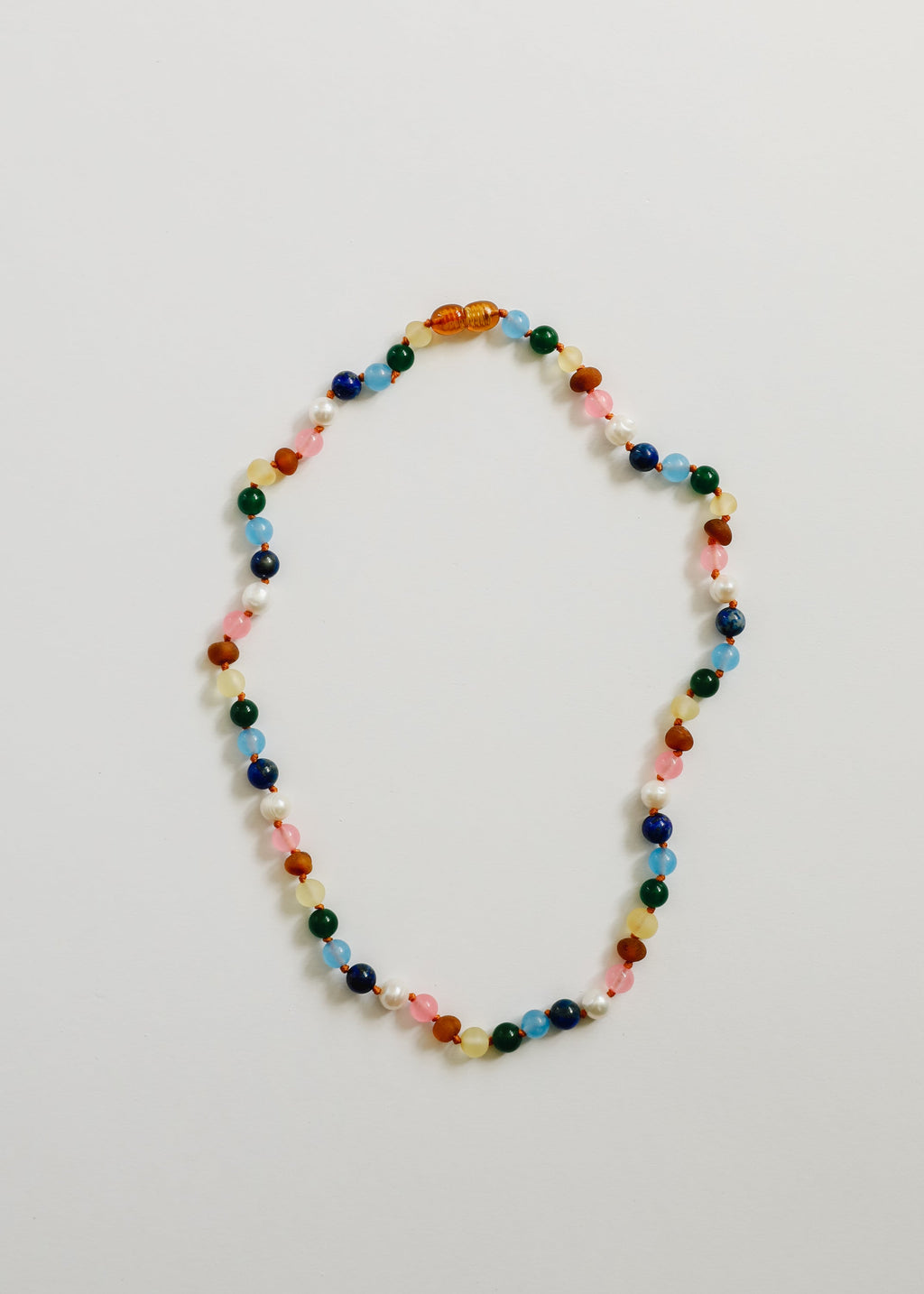 CanyonLeaf Raw Baltic Amber and Pearl Necklace + Sweet Pink Gemstones — lifestyle worn / used context