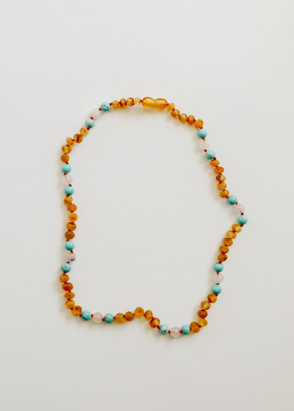 CanyonLeaf Raw Honey Baltic Amber and Natural Turquoise + Rose Quartz || Necklace — lifestyle context