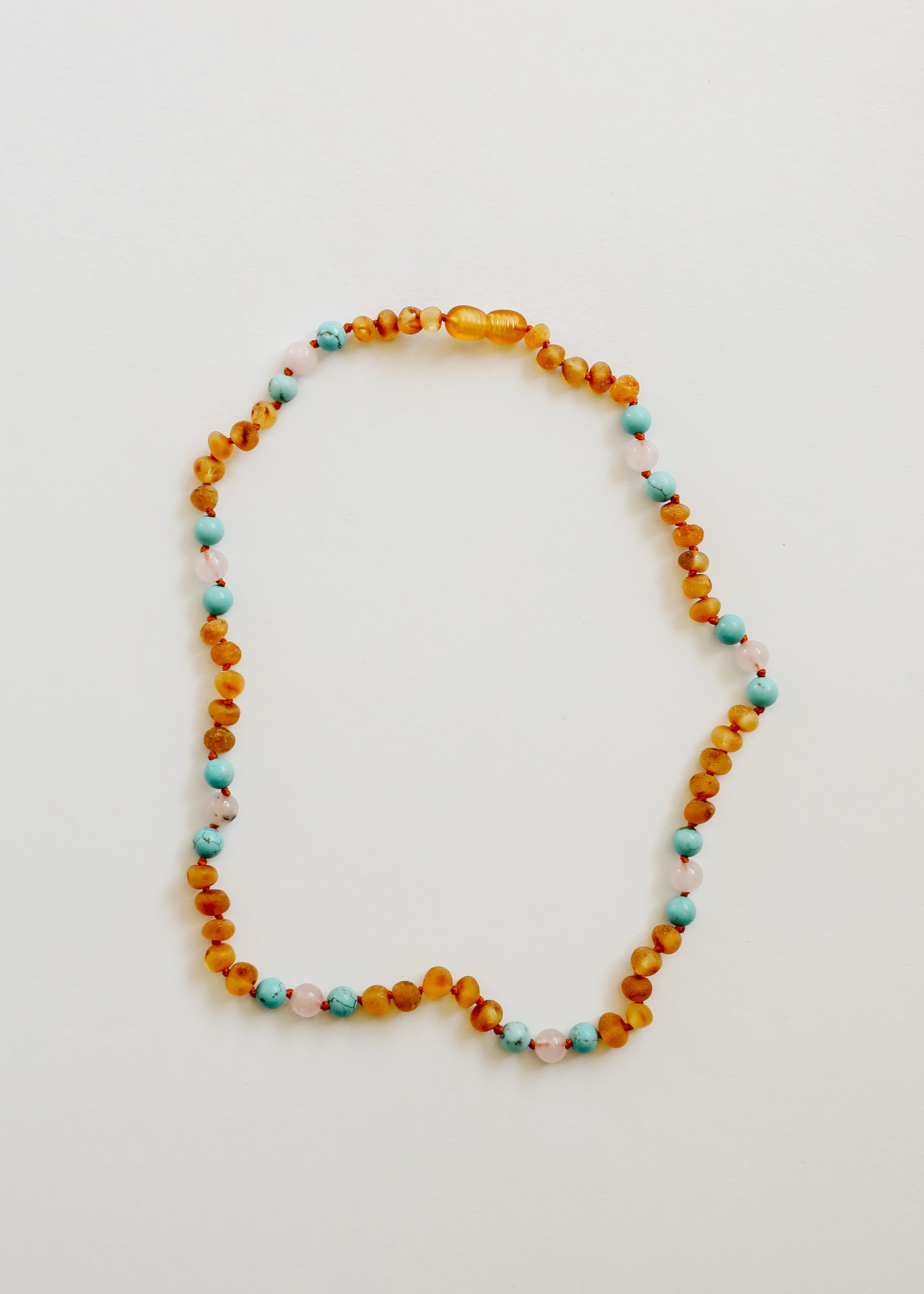 CanyonLeaf Raw Honey Baltic Amber and Natural Turquoise + Rose Quartz || Necklace — lifestyle context