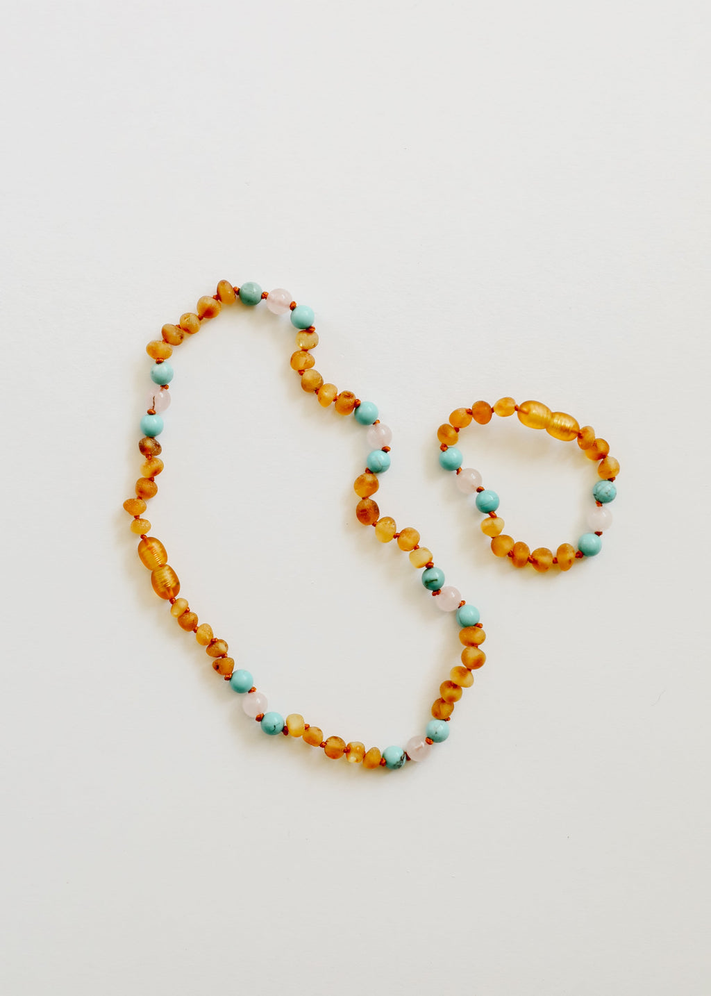 CanyonLeaf Raw Honey Baltic Amber and Natural Turquoise + Rose Quartz || Necklace — side view