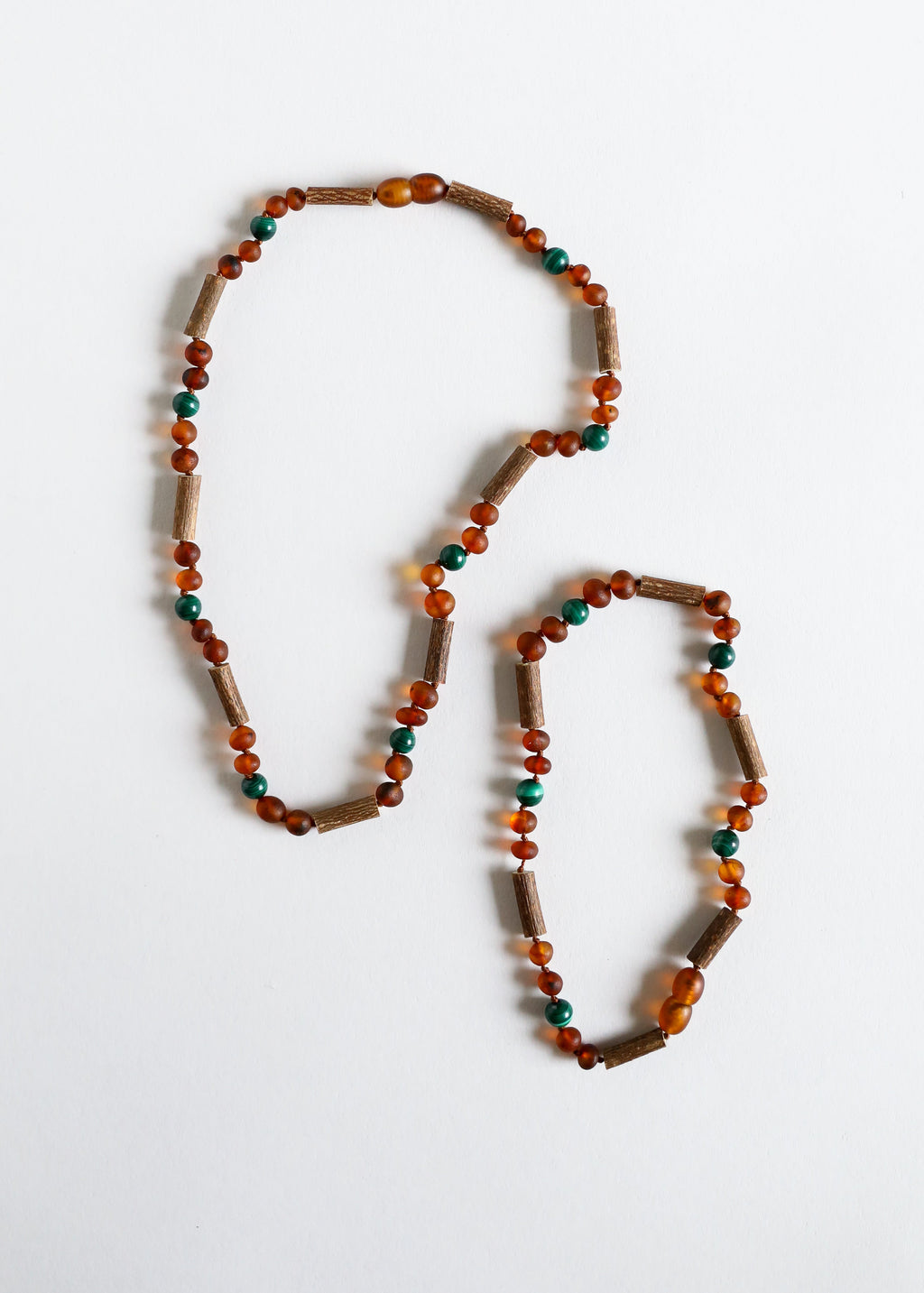 CanyonLeaf Hazelwood || Raw Cognac Baltic Amber + Malachite || Necklace — necklace category context