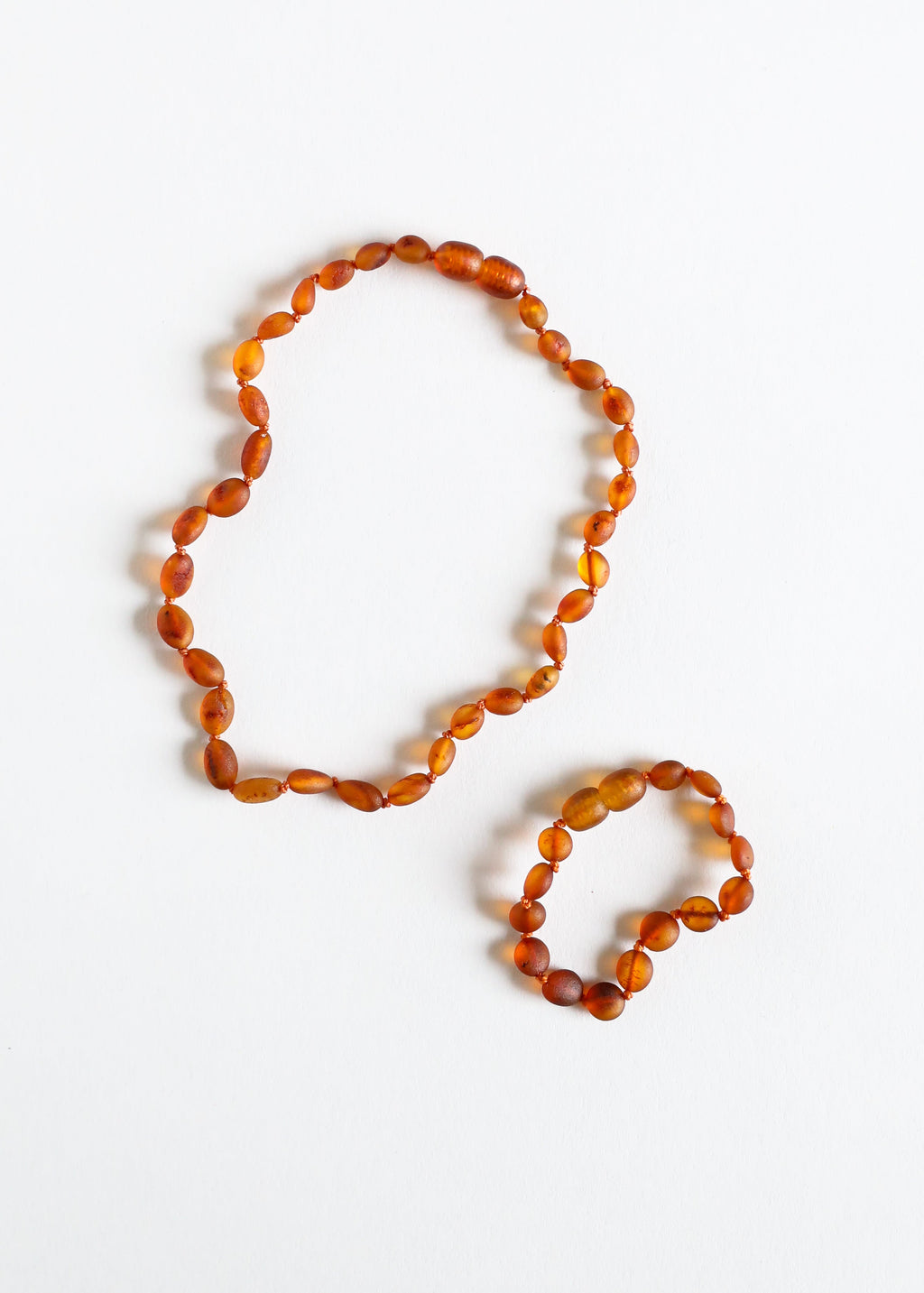 CanyonLeaf Raw Cognac Baltic Amber || Classic || Necklace — lifestyle worn / used context