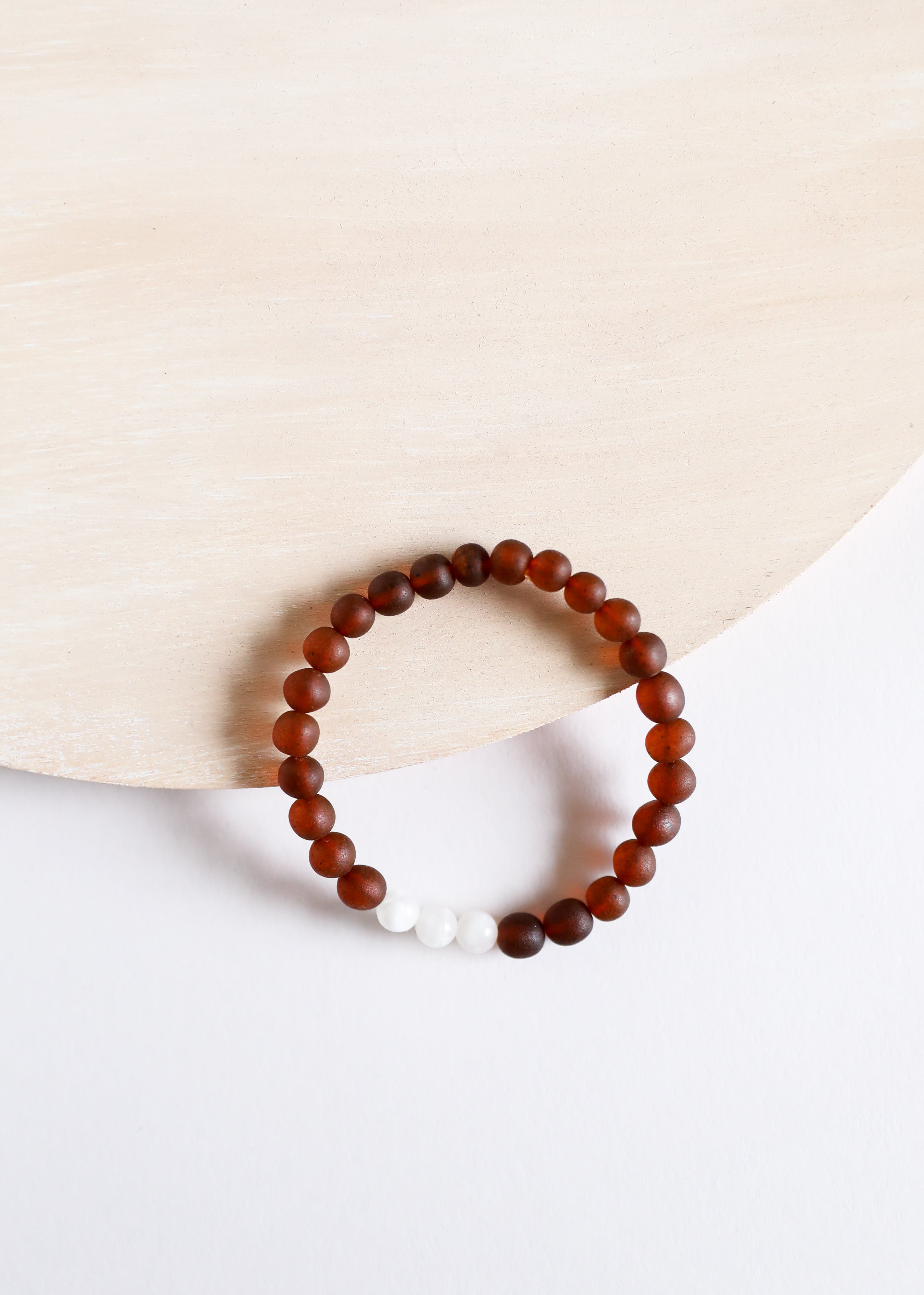 CanyonLeaf Raw Cognac Baltic Amber + Moonstone || Adult Bracelet — lifestyle context