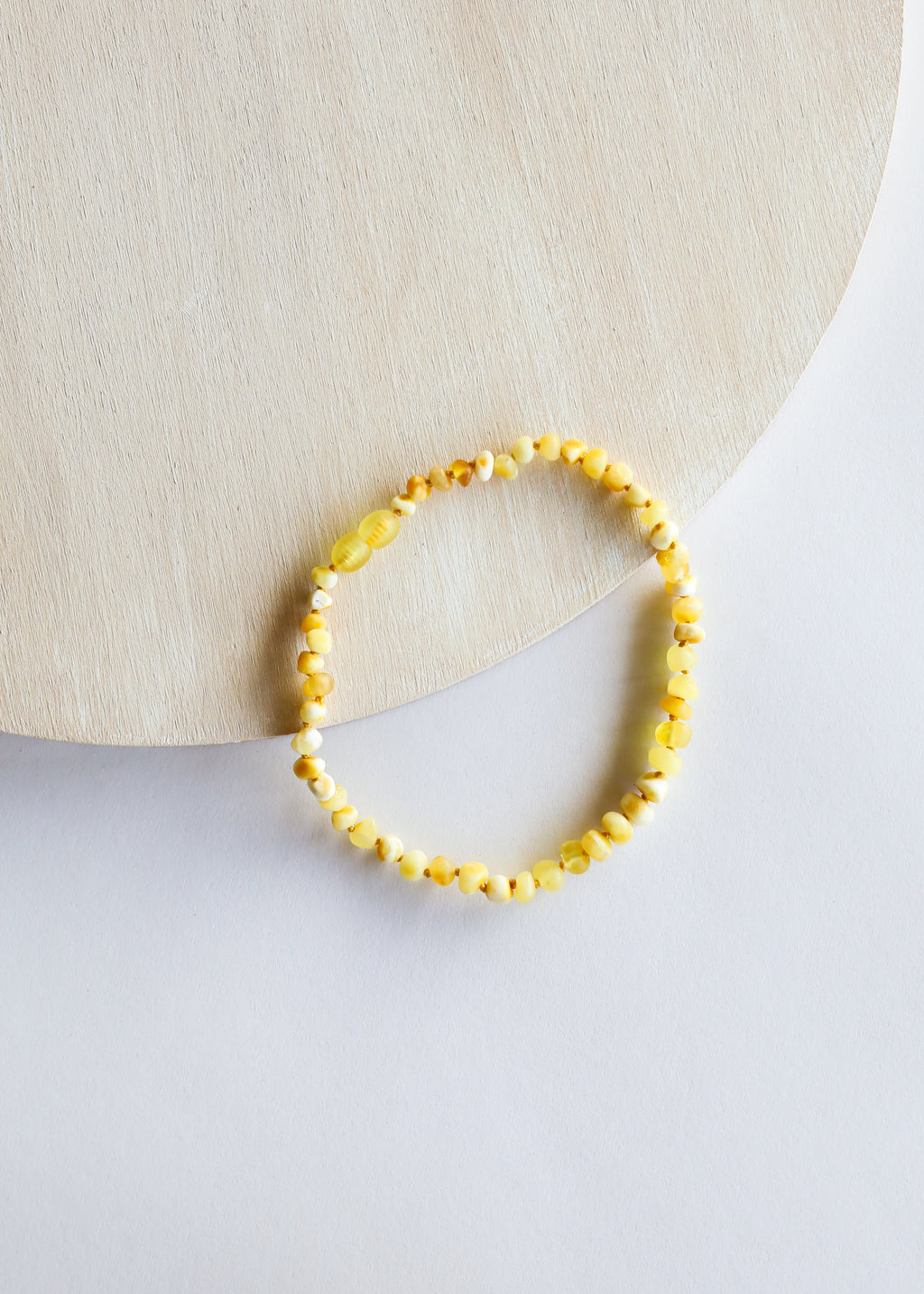 CanyonLeaf Raw Butterscotch Baltic Amber || Necklace — CanyonLeaf branding close-up
