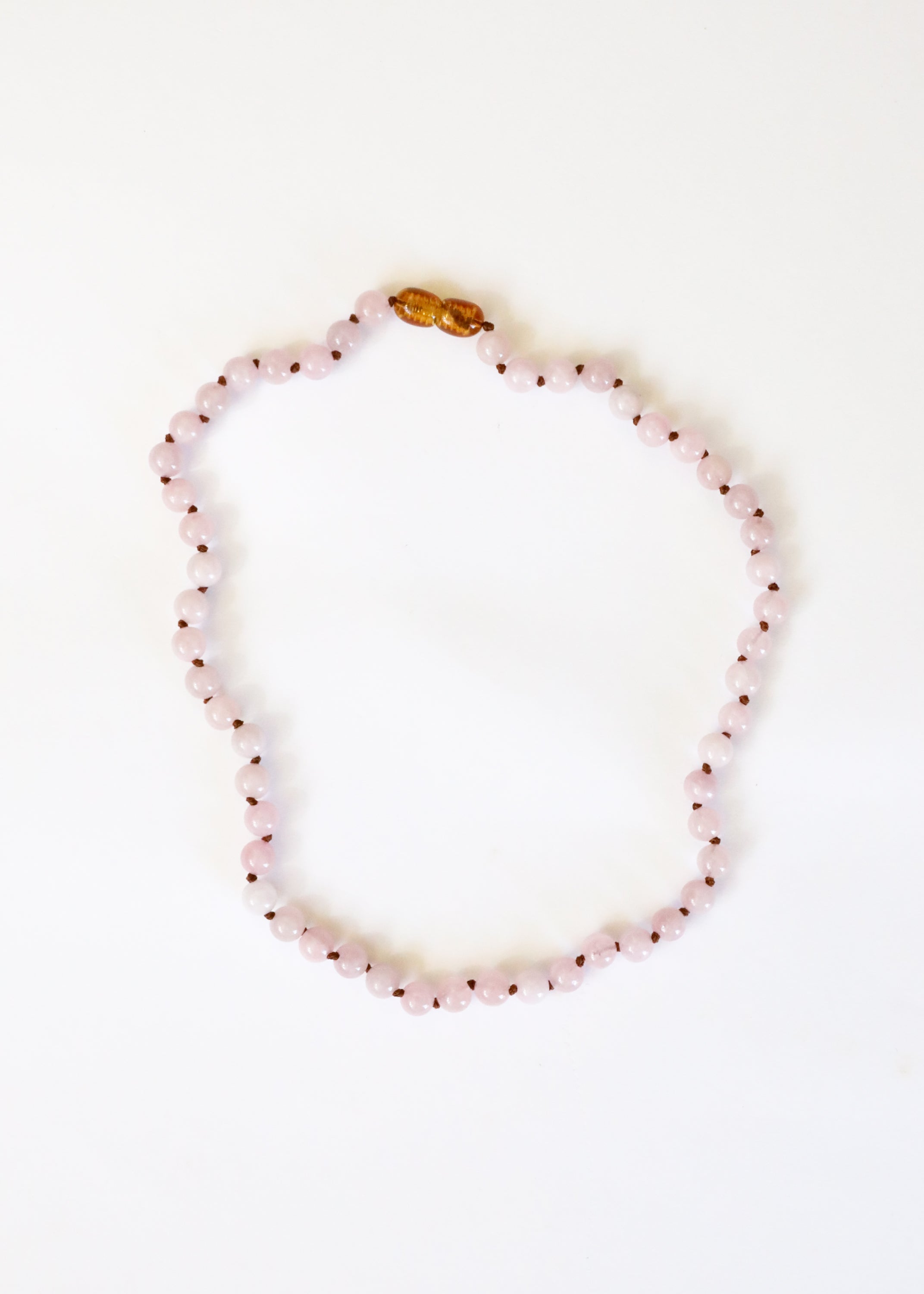 CanyonLeaf Pure Gemstone + Natural Rose Quartz || Beaded Necklace — CanyonLeaf branding close-up