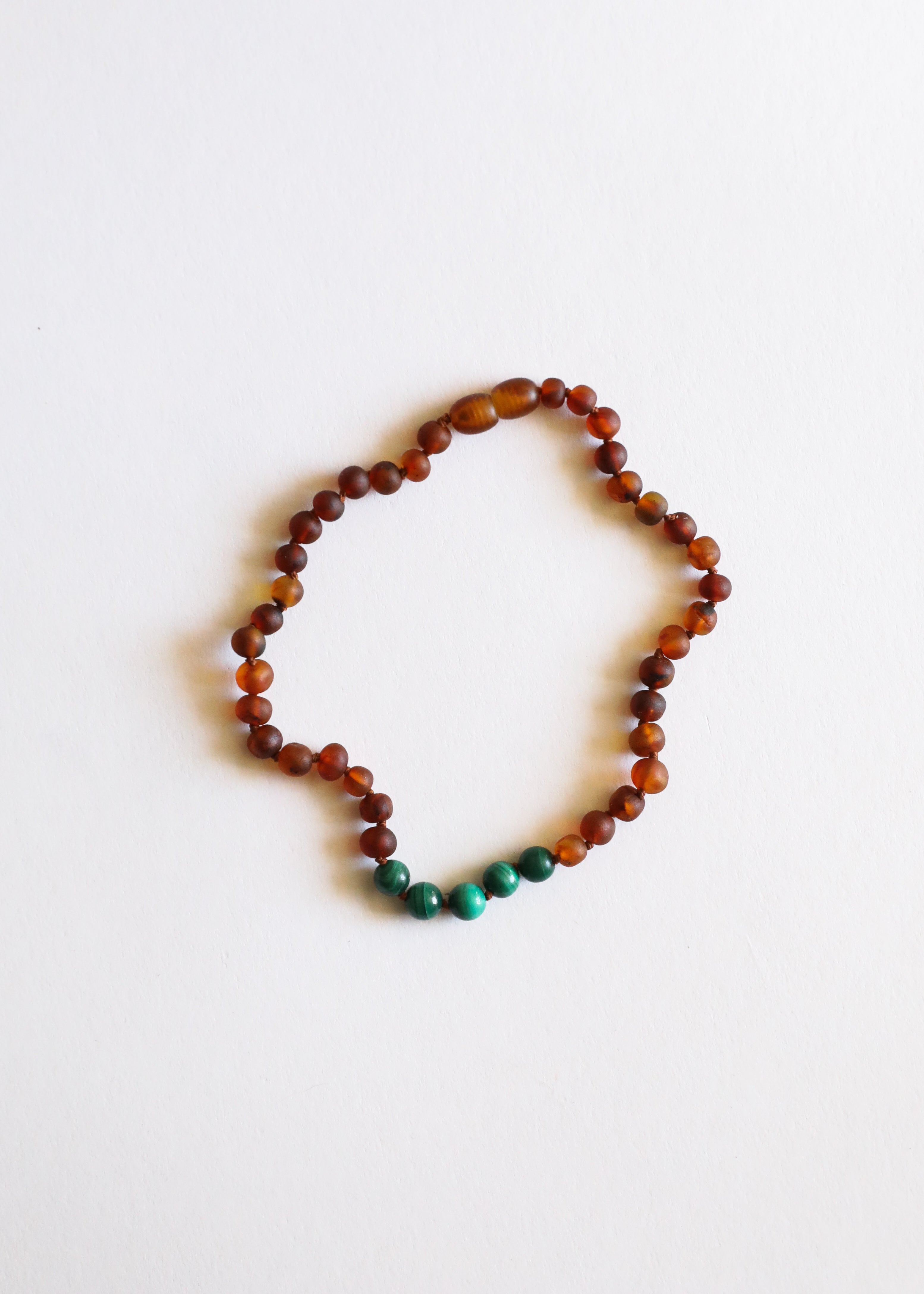 CanyonLeaf Raw Cognac Baltic Amber + Malachite || Necklace — main product shot