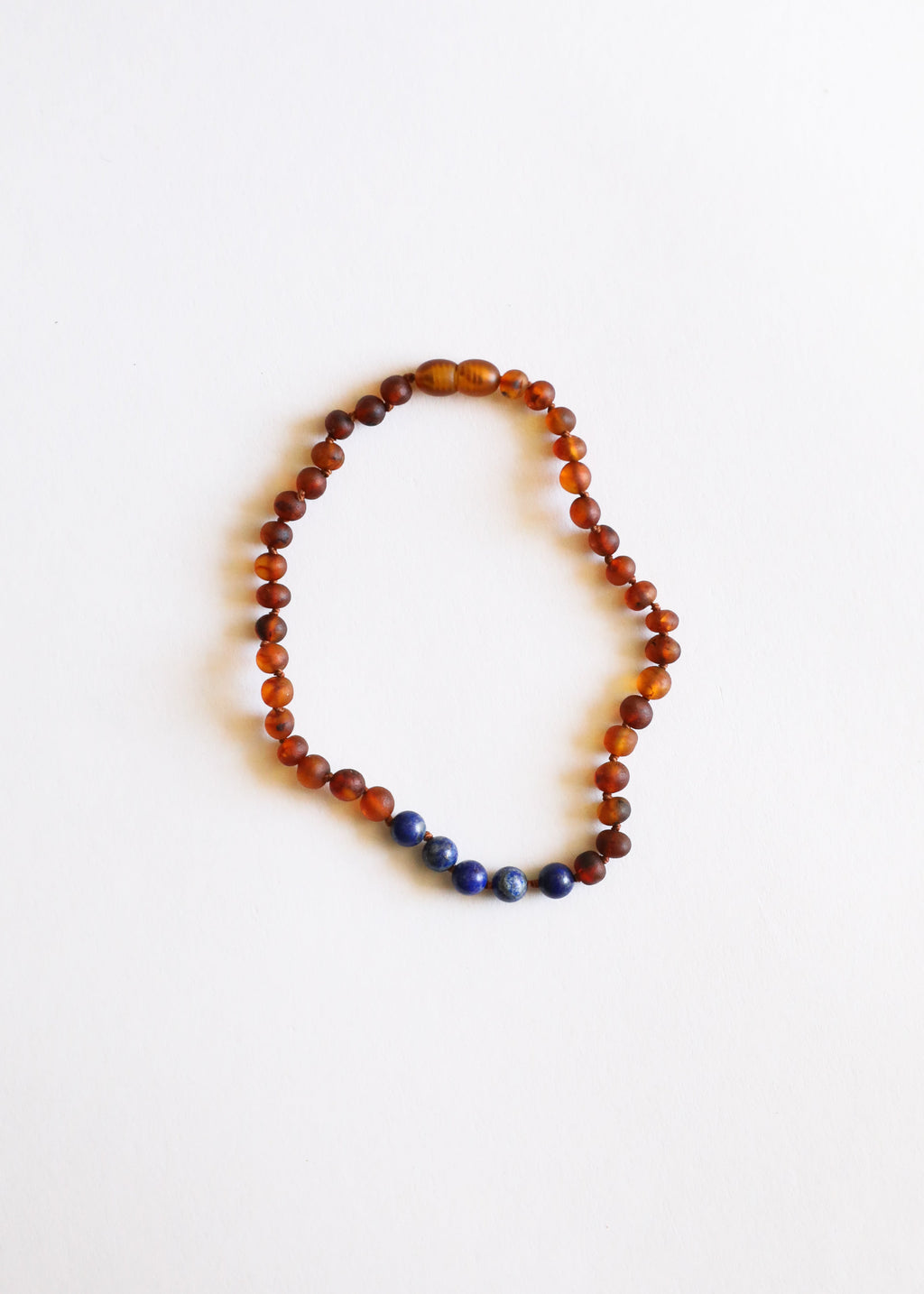 CanyonLeaf Raw Cognac Baltic Amber + Lapis Stone Necklace — main product shot