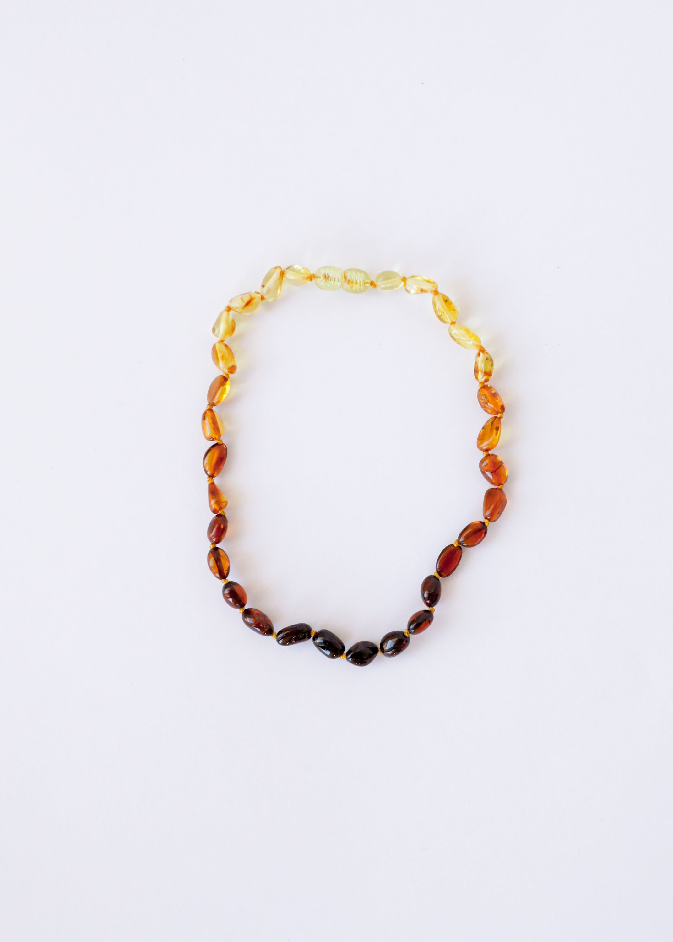 CanyonLeaf Polished Ombre Baltic Amber || Necklace — CanyonLeaf branding close-up