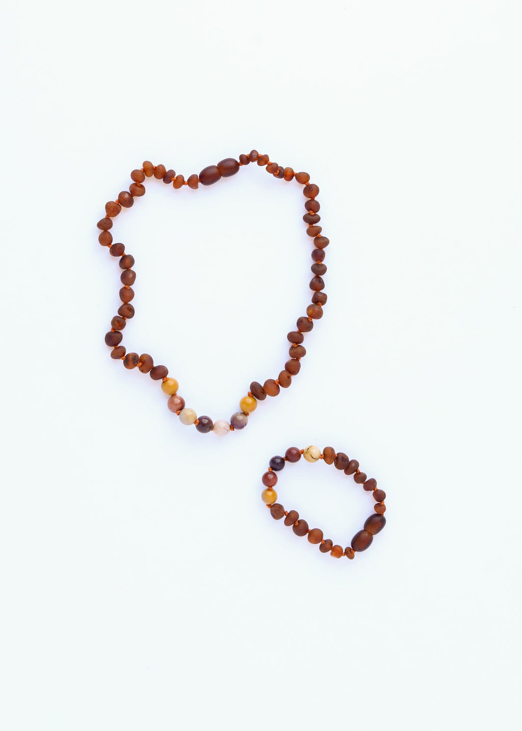 CanyonLeaf Raw Cognac Baltic Amber + Mookaite Jasper || Necklace — lifestyle worn / used context