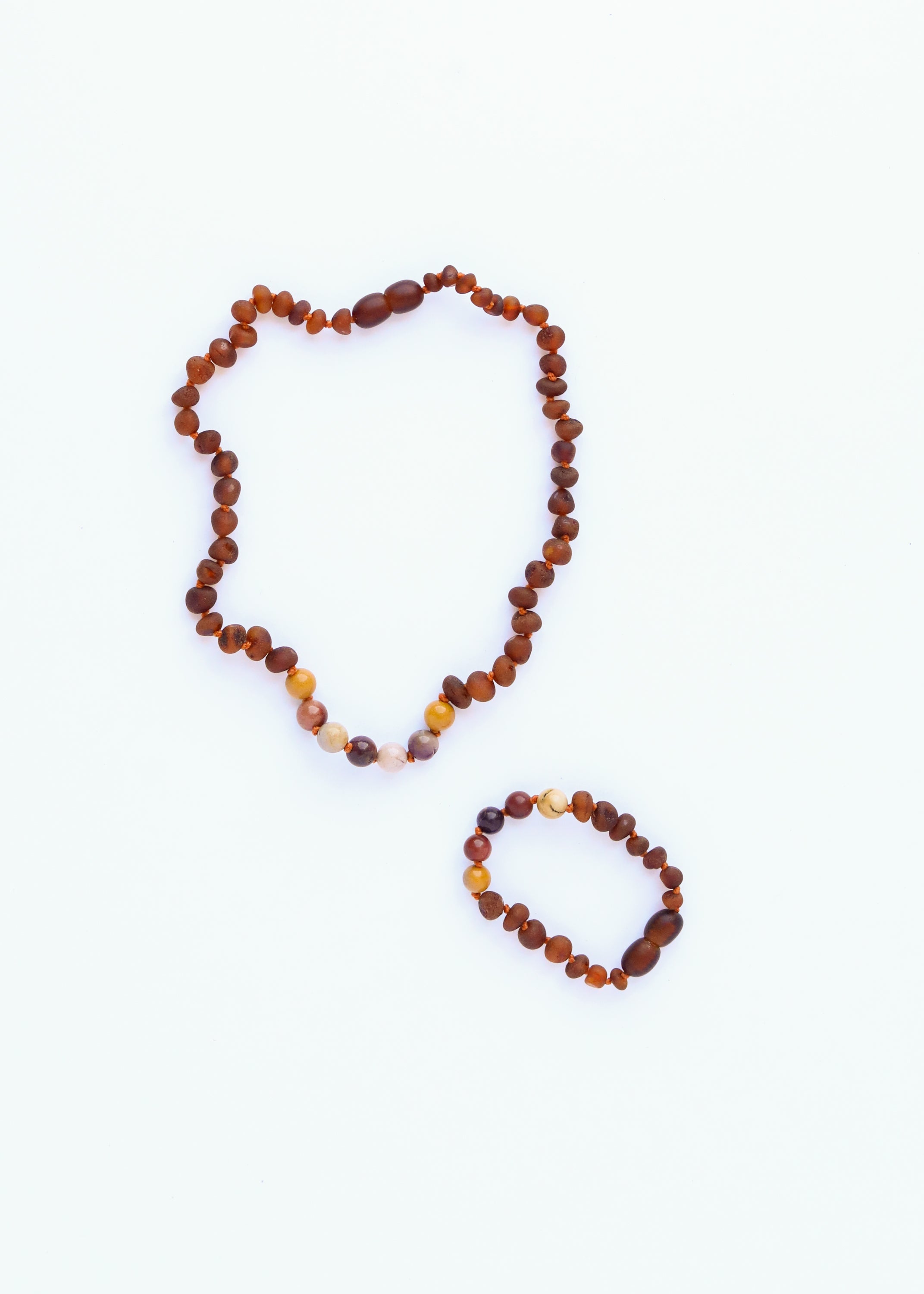 CanyonLeaf Raw Cognac Baltic Amber + Mookaite Jasper || Necklace — lifestyle worn / used context
