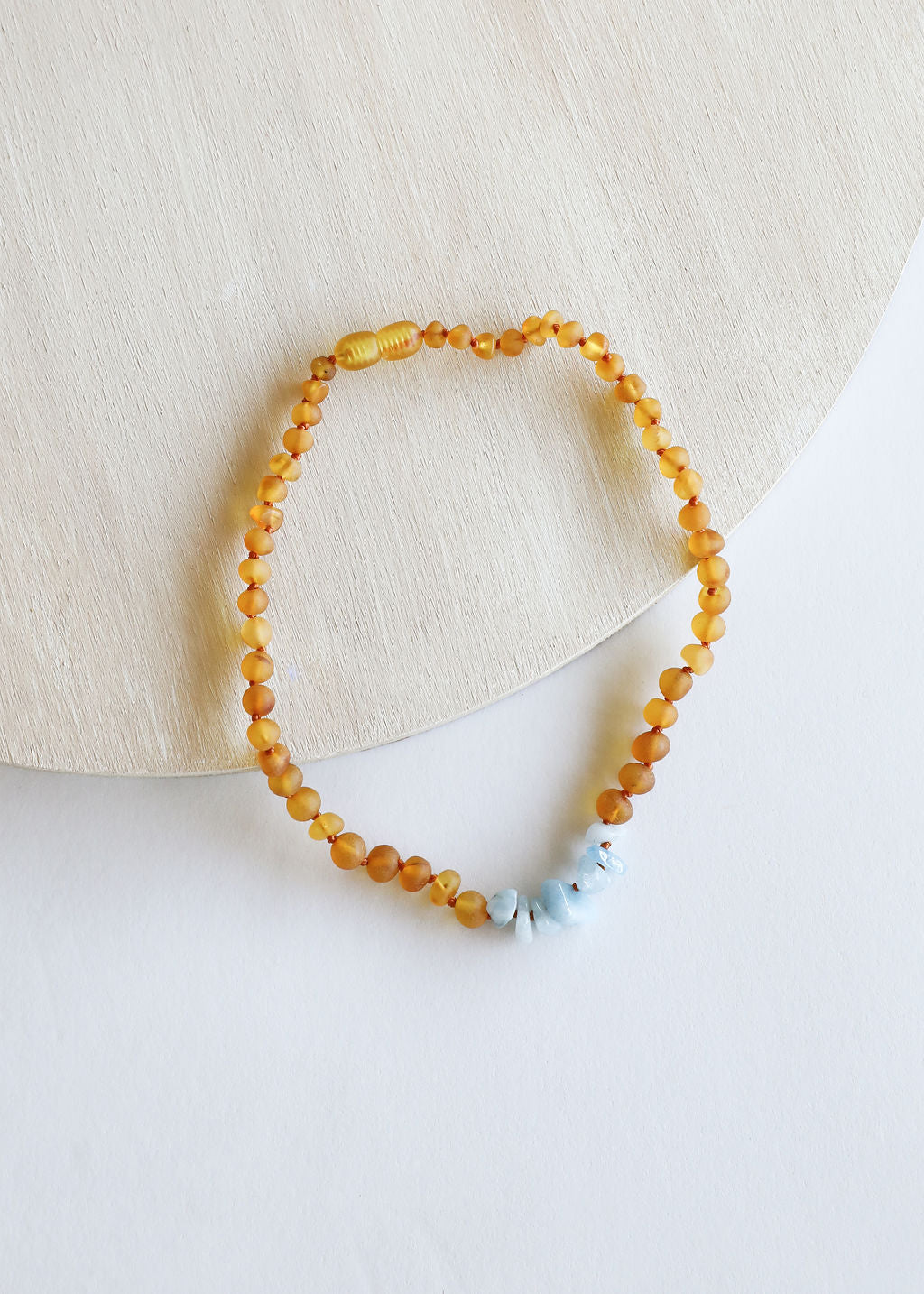 CanyonLeaf Raw Honey Baltic Amber + Aquamarine || Necklace — CanyonLeaf branding close-up
