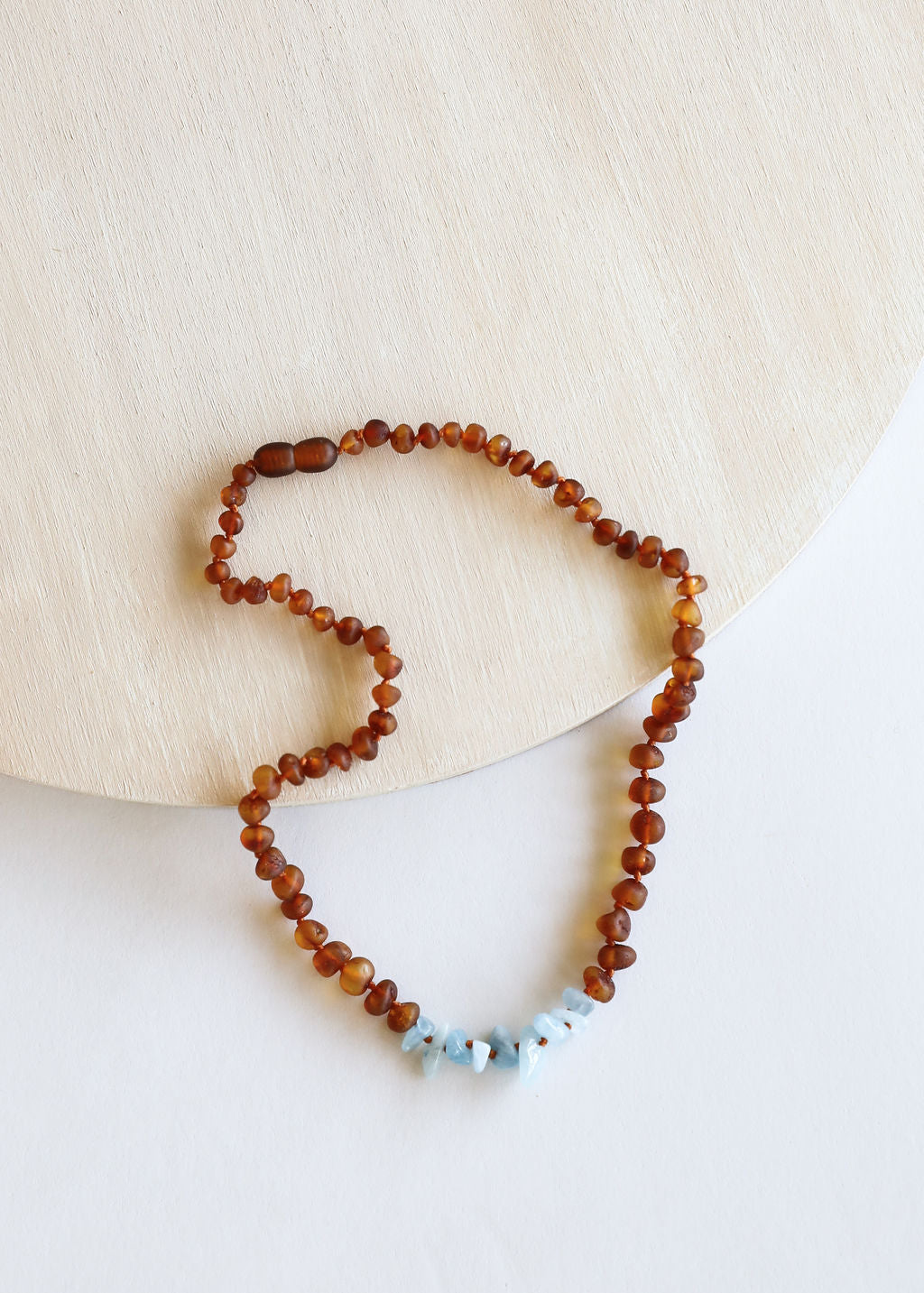 CanyonLeaf Raw Cognac Baltic Amber + Aquamarine || Necklace — lifestyle worn / used context