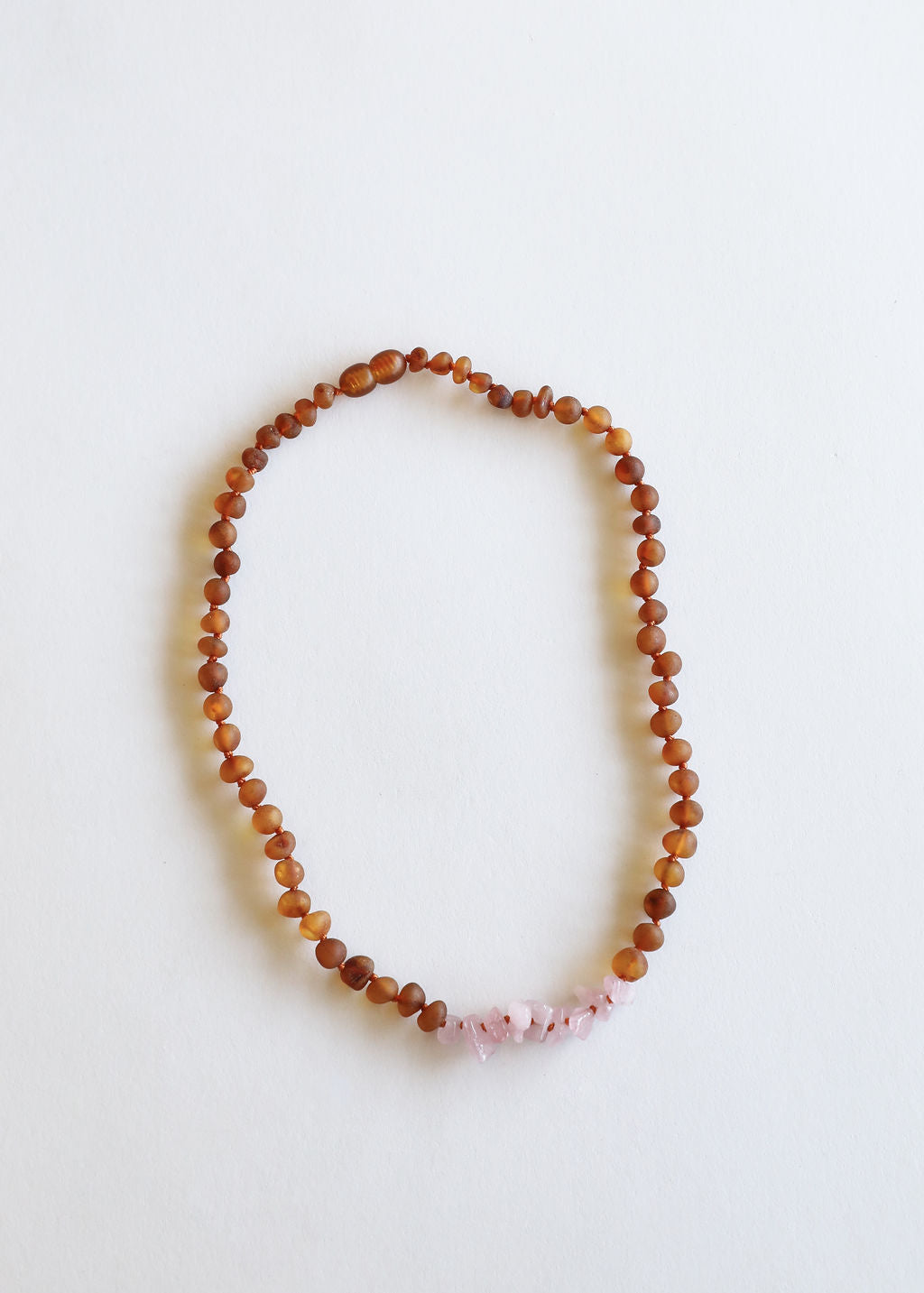CanyonLeaf Raw Cognac Baltic Amber + Raw Rose Quartz || Necklace — CanyonLeaf branding close-up